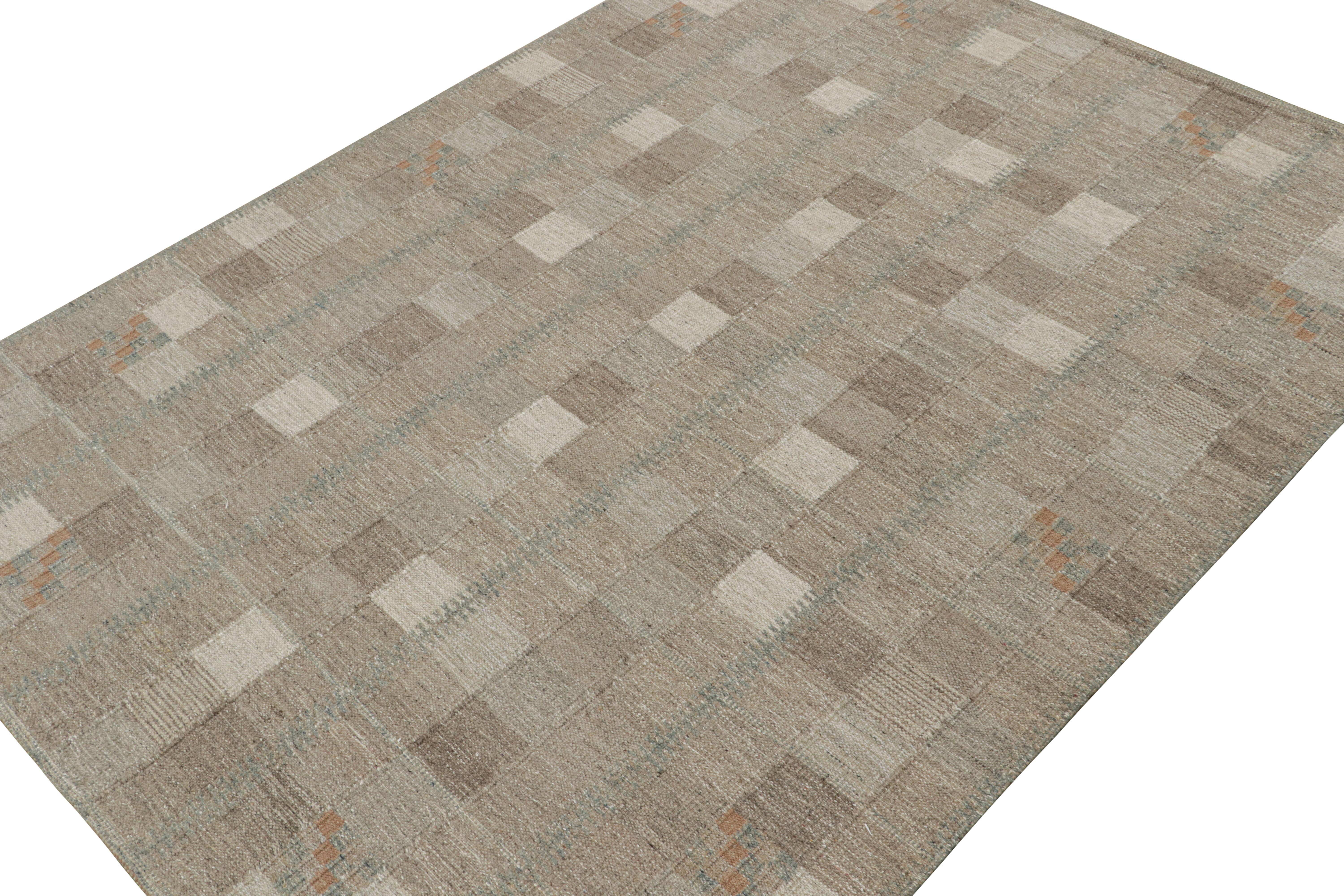 Una elegante alfombra kilim de estilo sueco de 9x12 de nuestra galardonada colección de tejido plano escandinavo. Tejido a mano en lana e hilo natural sin teñir.

Sobre el diseño: 

Esta alfombra presenta motivos geométricos en marrón y gris. Los