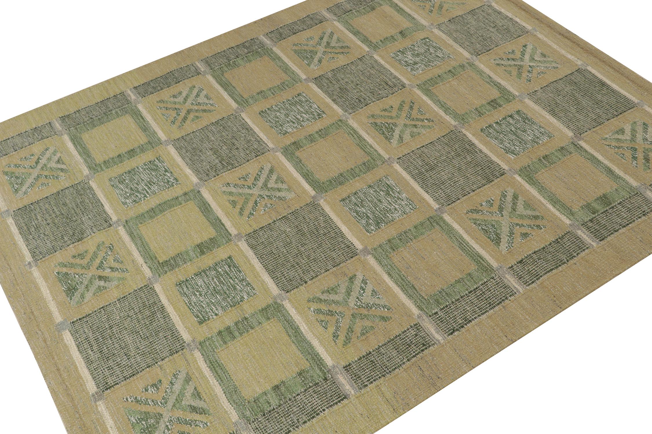 A smart 8x10 Swedish style kilim from our award-winning Scandinavian flat weave collection. Handwoven in wool. 
On the Design: 
This rug enjoys a defined movement with geometric patterns in refreshing beige, gray and green. Khaki and ochre