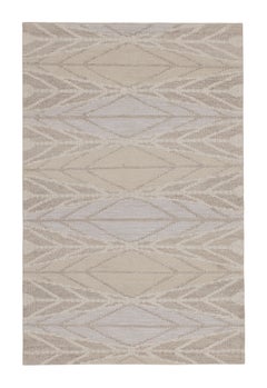 Rug & Kilim in stile scandinavo con motivi geometrici beige, bianchi e blu