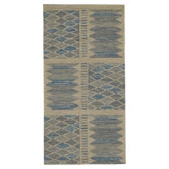 Kilim de estilo escandinavo de Rug
Kilim con estampado geométrico en azul, beige y gris