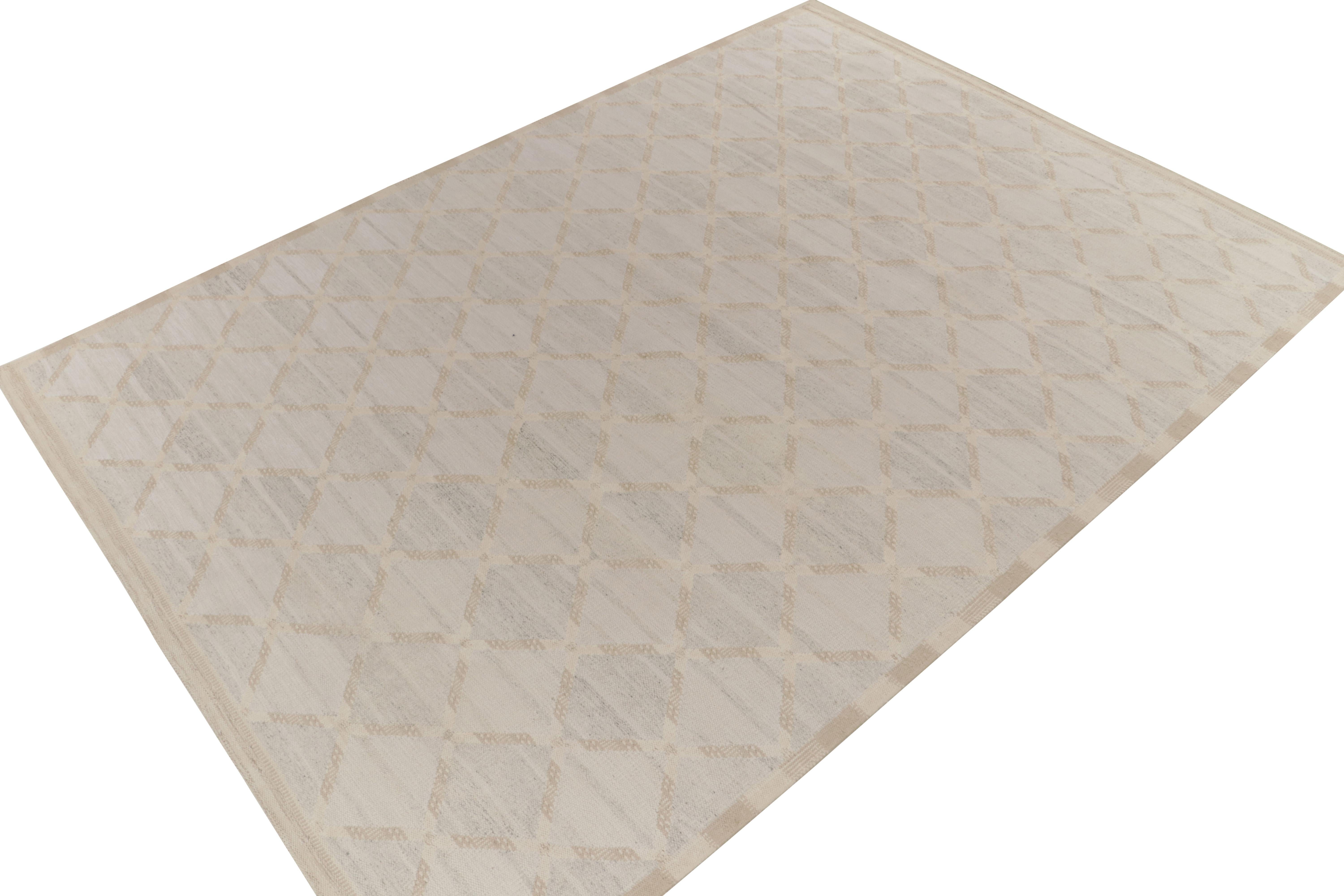 Un tissage plat 10x14 de la Collection Kilim Scandinave de Rug & Kilim ; une nouvelle édition parmi nos designs les plus appréciés. 

Sur le Design/One : La pièce présente une composition froide avec des tons apaisants de bleu pâle, de beige-brun