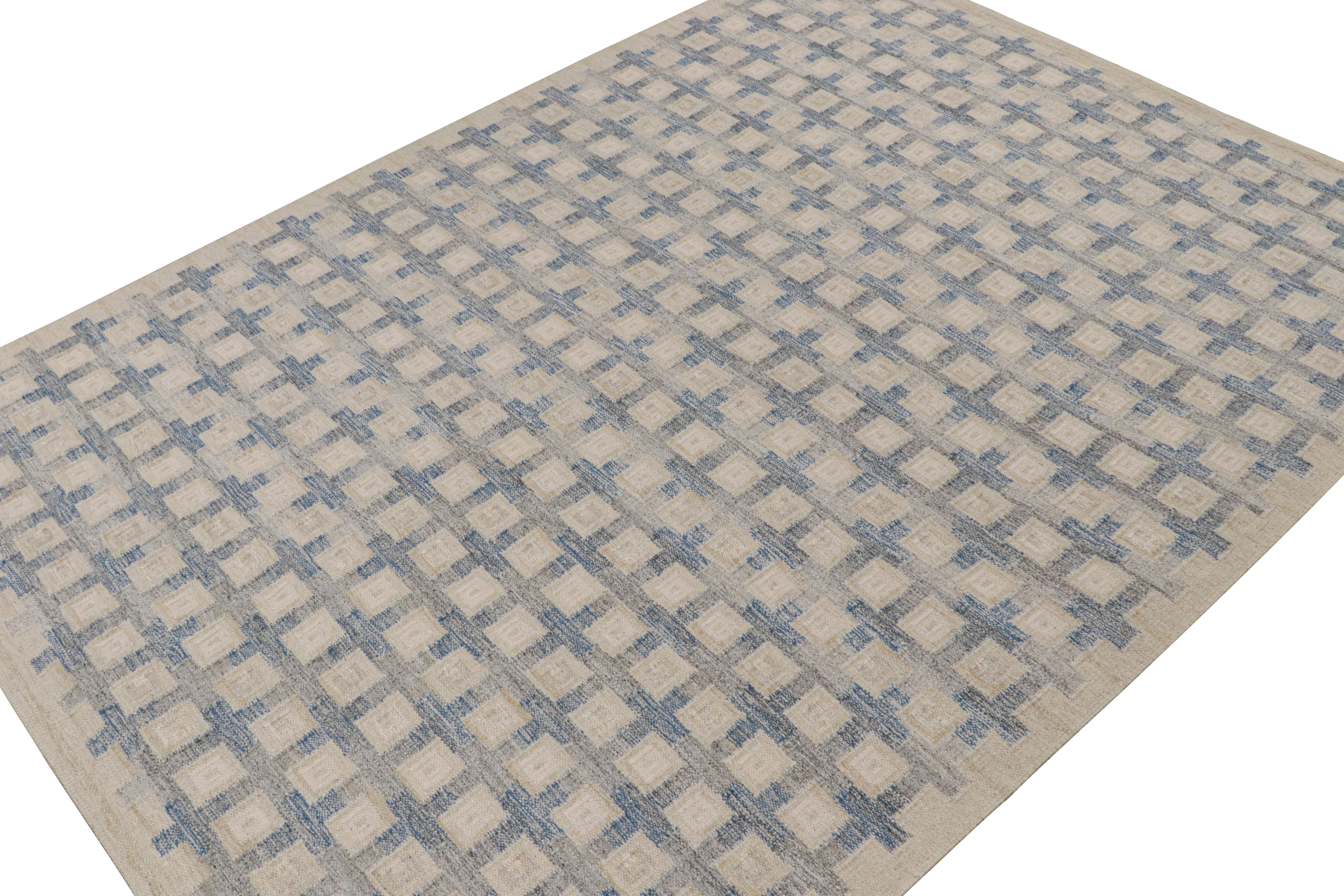 Cette carte 10×14  kilim fait partie de la collection de tapis scandinaves primés de Rug & Kilim. Tissé à la main en laine et fils naturels non teints, son design s'inspire des tissages plats minimalistes suédois du milieu du siècle du style