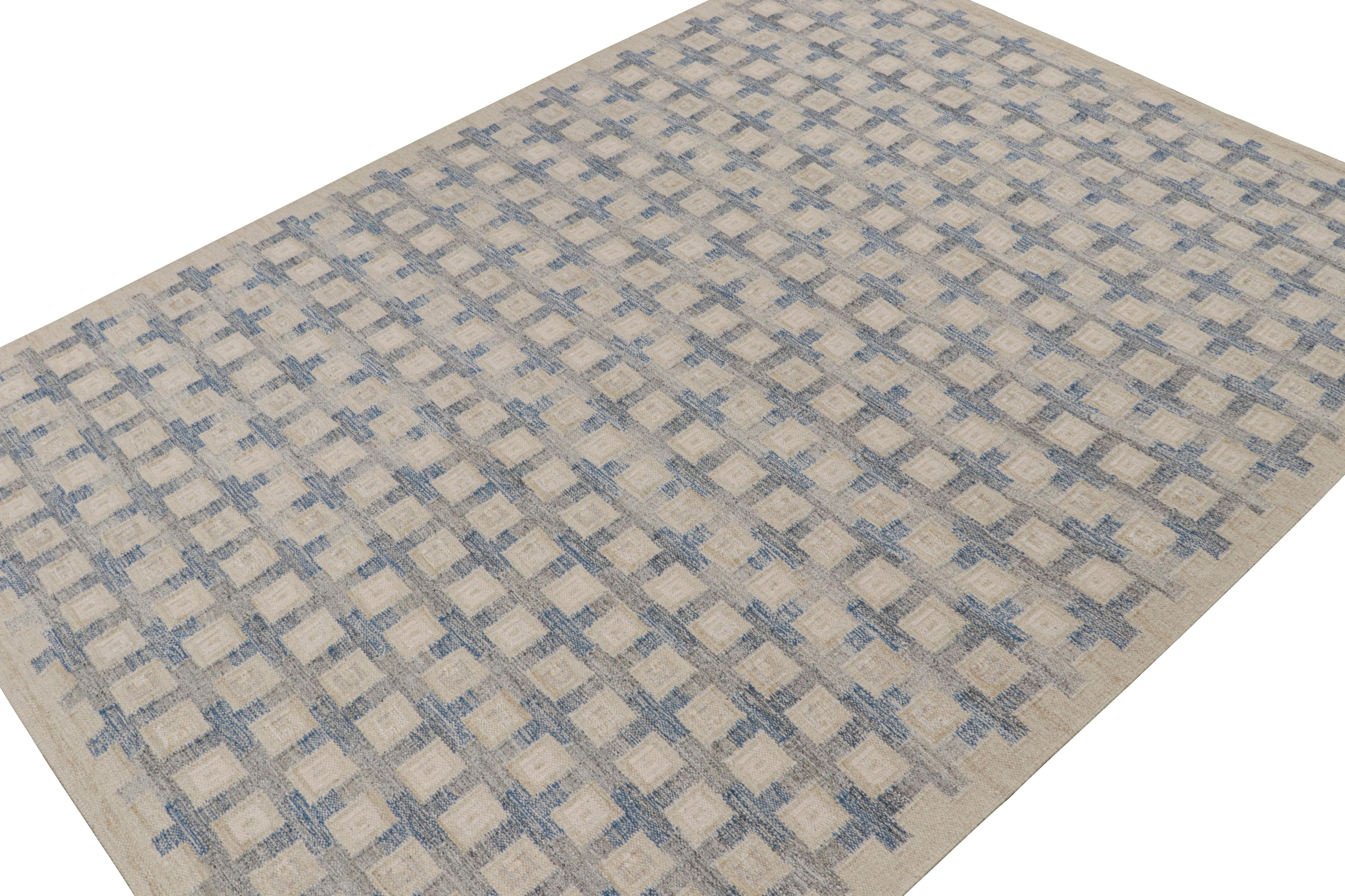 A smart 10x14 Swedish style kilim from our award-winning Scandinavian flat weave collection. Handwoven in wool, cotton & undyed natural yarns.

On the Design: 

This rug enjoys geometric patterns in blue, black & beige. Keen eyes will admire undyed,
