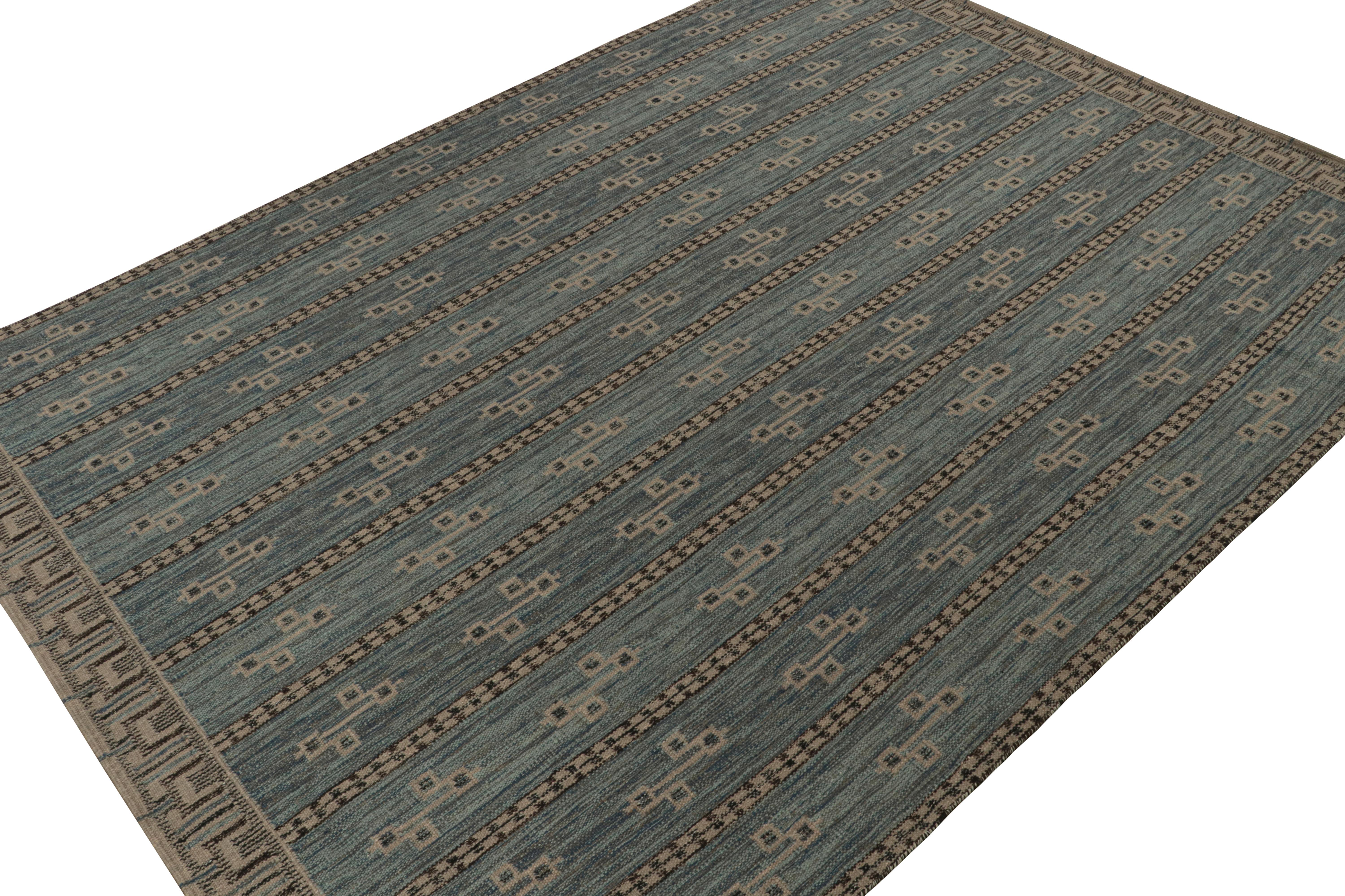 A smart 10x14 Swedish style kilim from our award-winning Scandinavian flat weave collection. Handwoven in wool, cotton & undyed natural yarns.

On the Design: 

This rug enjoys geometric patterns in blue, gray & black. Keen eyes will admire undyed,