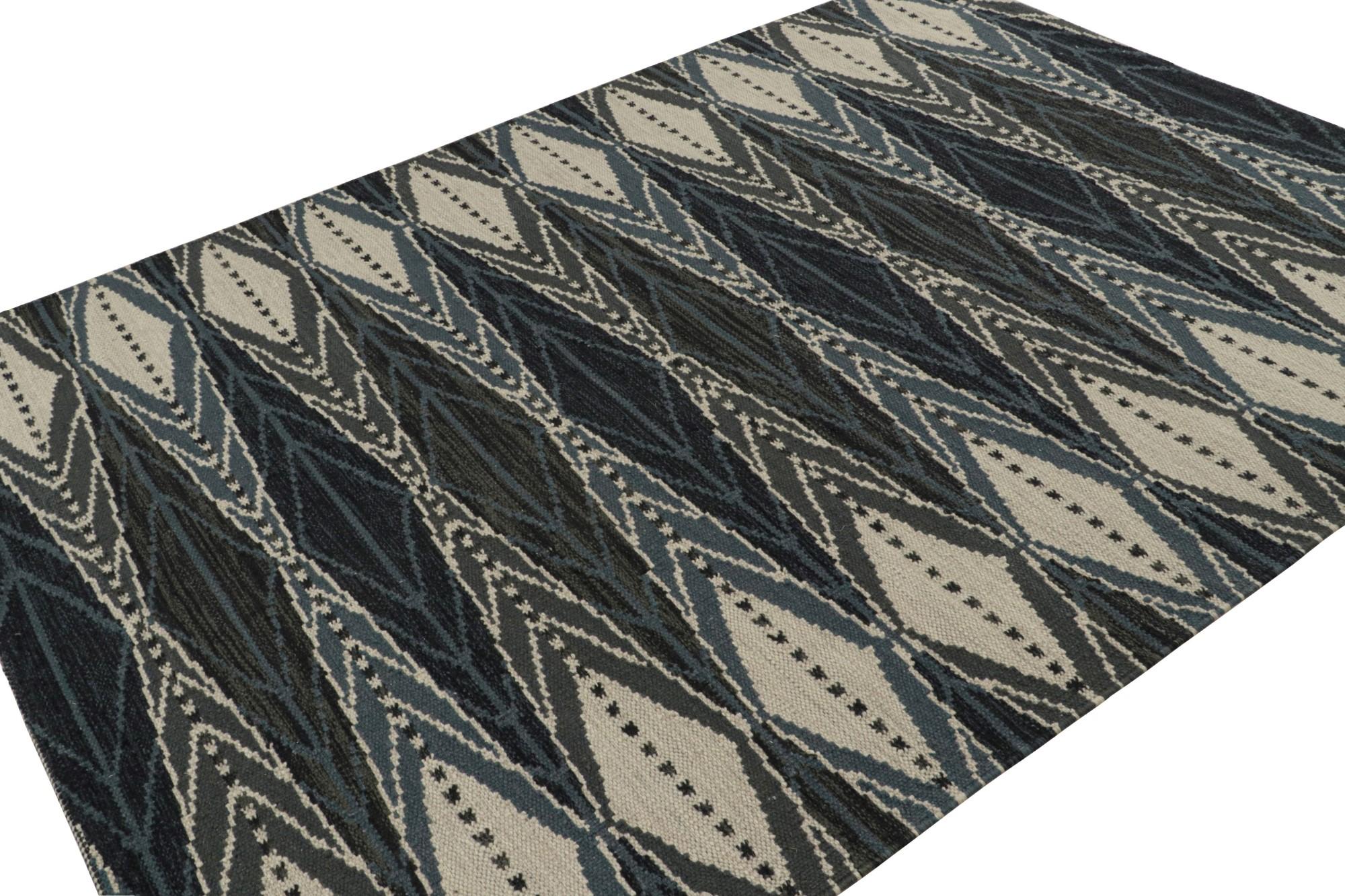 A smart 6x9 Swedish style kilim from our award-winning Scandinavian flat weave collection. Handwoven in wool, cotton & undyed natural yarns.

On the Design: 

This rug enjoys geometric patterns in tones of blue & grey. Keen eyes will admire undyed,