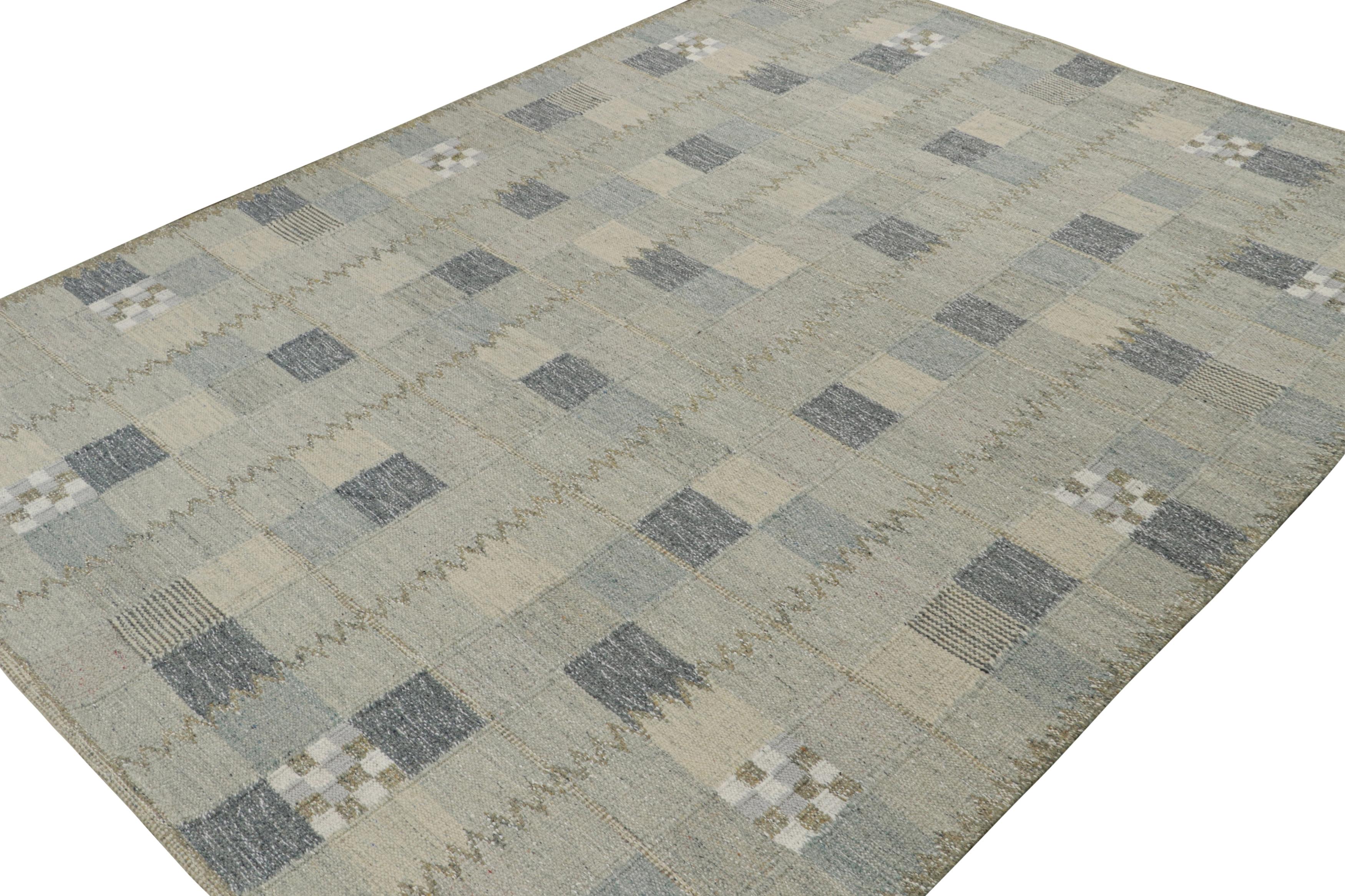 An elegant 9x12 Swedish style kilim from our award-winning Scandinavian flat weave collection. Handwoven in wool & undyed natural yarns.

On the Design: 

This rug enjoys a play of tones of blue with gray for a very cool, coastal vibe in our