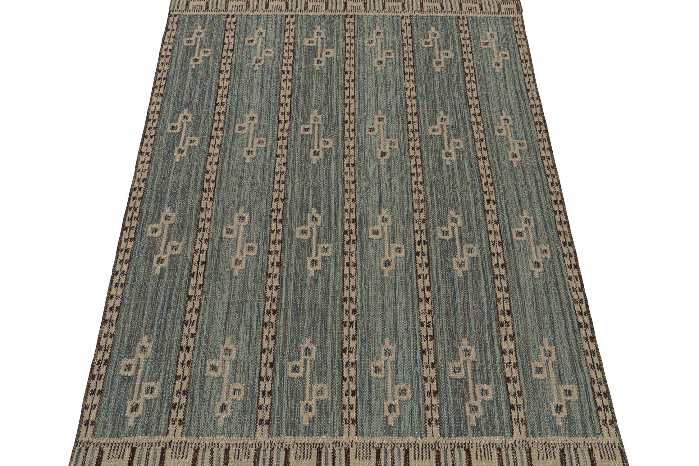 This 6x9 flat weave is a new addition to the Scandinavian Kilim collection by Rug & Kilim. Handwoven in wool and natural yarns, its design reflects a contemporary take on mid-century Rollakans and Swedish Deco style.

On the Design:

This new