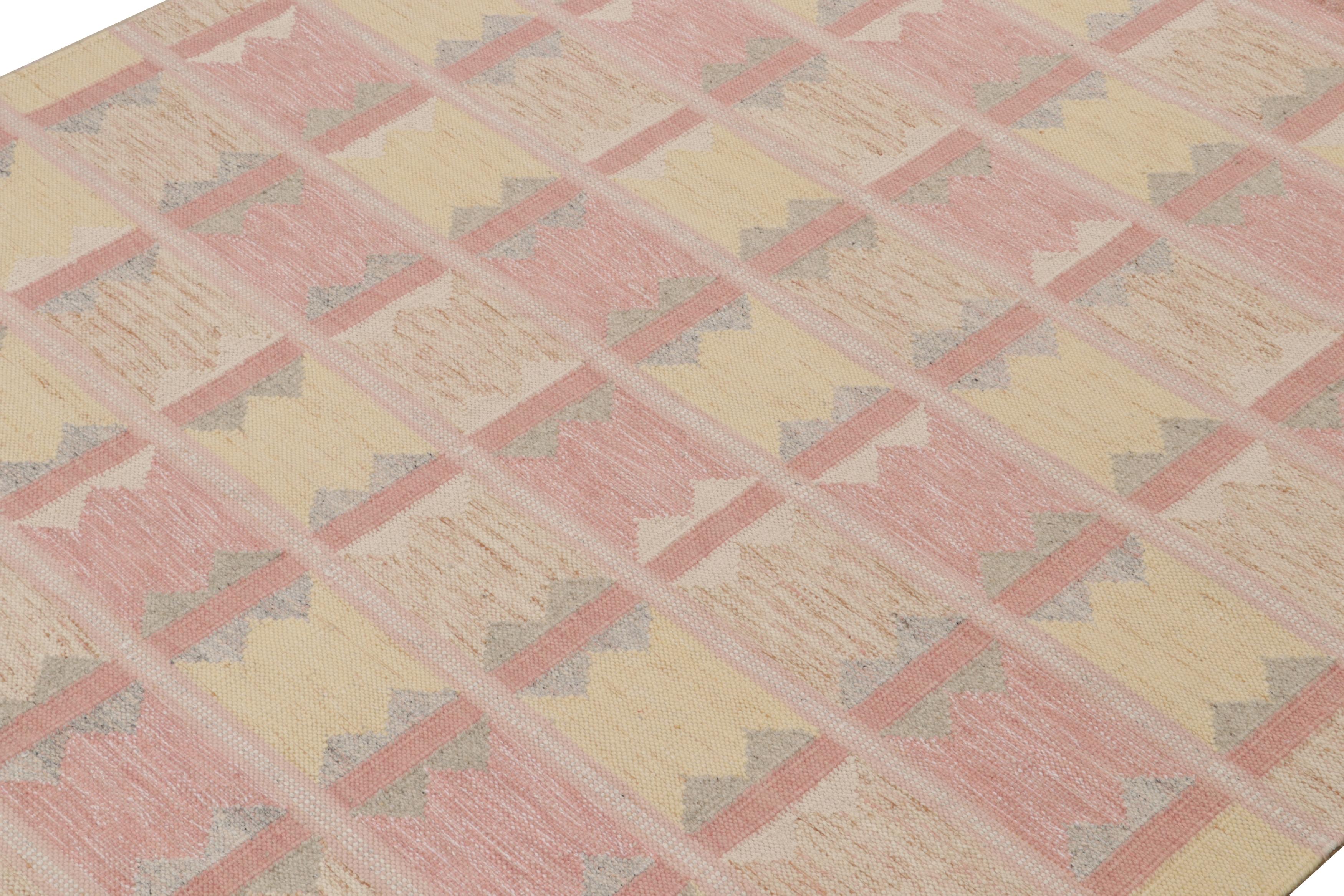 This 9x15 Swedish style kilim is an exciting new design from Rug & Kilim’s award-winning Scandinavian flat weave collection. Handwoven in wool and undyed natural yarns, its design reflects a contemporary take on mid-century Rollakans and Swedish