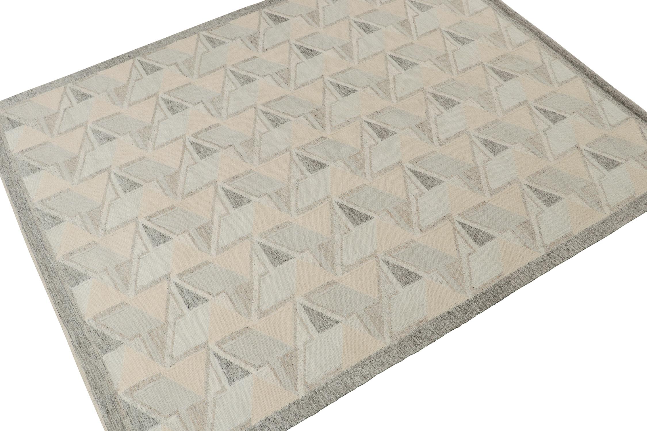 This smart 8 x 10 Swedish style kilim is the next addition to Rug & Kilim's award-winning Scandinavian flat weave collection. Handwoven in wool. 
Further On the Design: 
This rug enjoys geometric patterns in crisp beige and gray, with creamy