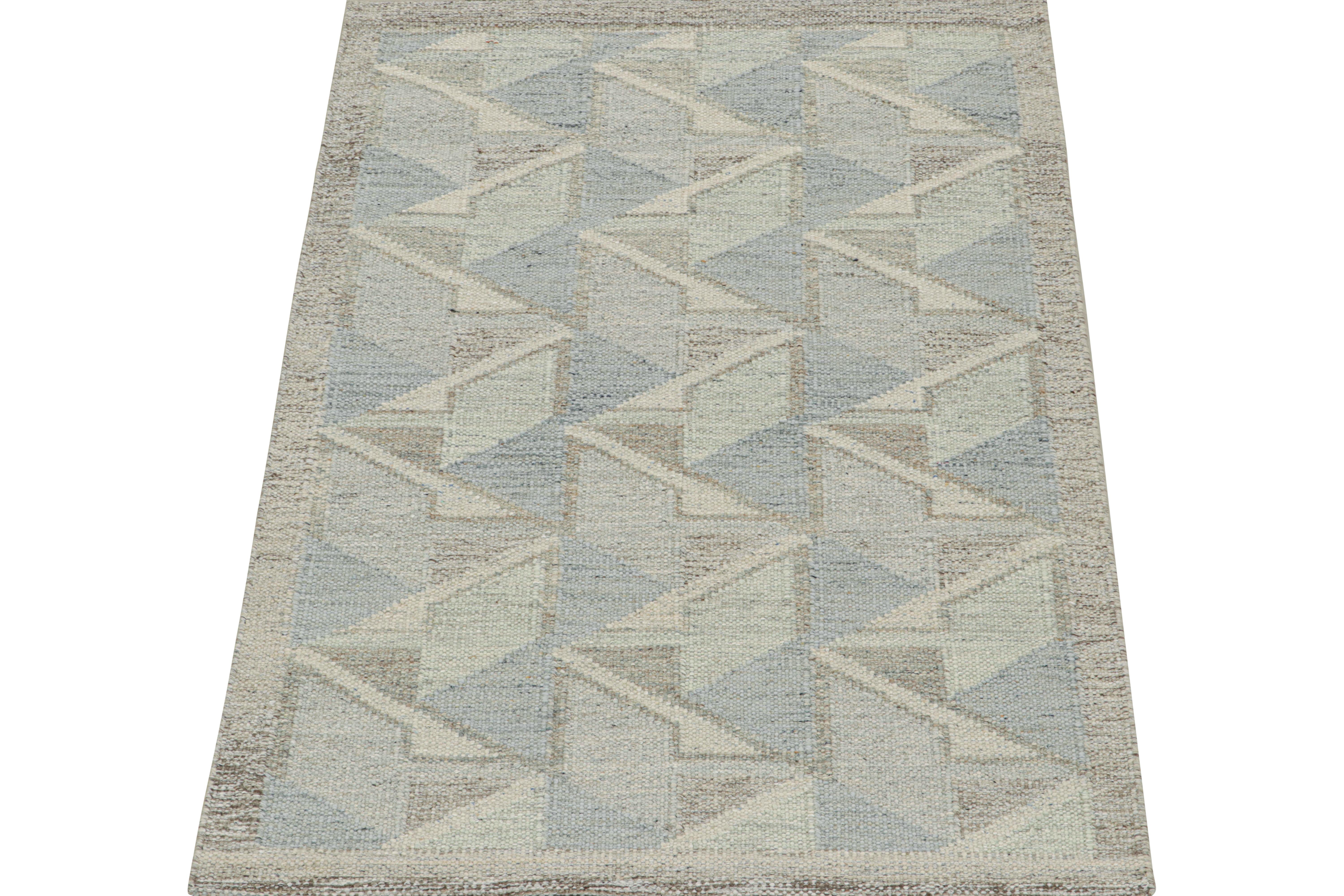 This 4x6 flat weave is a new addition to the Scandinavian Kilim collection by Rug & Kilim. Handwoven in wool and natural yarns, its design reflects a contemporary take on mid-century Rollakans and Swedish Deco style.

On the design:

This new