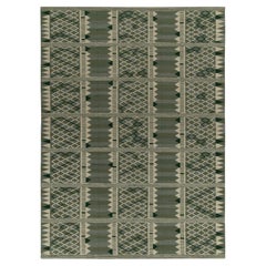 Rug
Kilim è un kilim in stile scandinavo con motivo geometrico verde e bianco