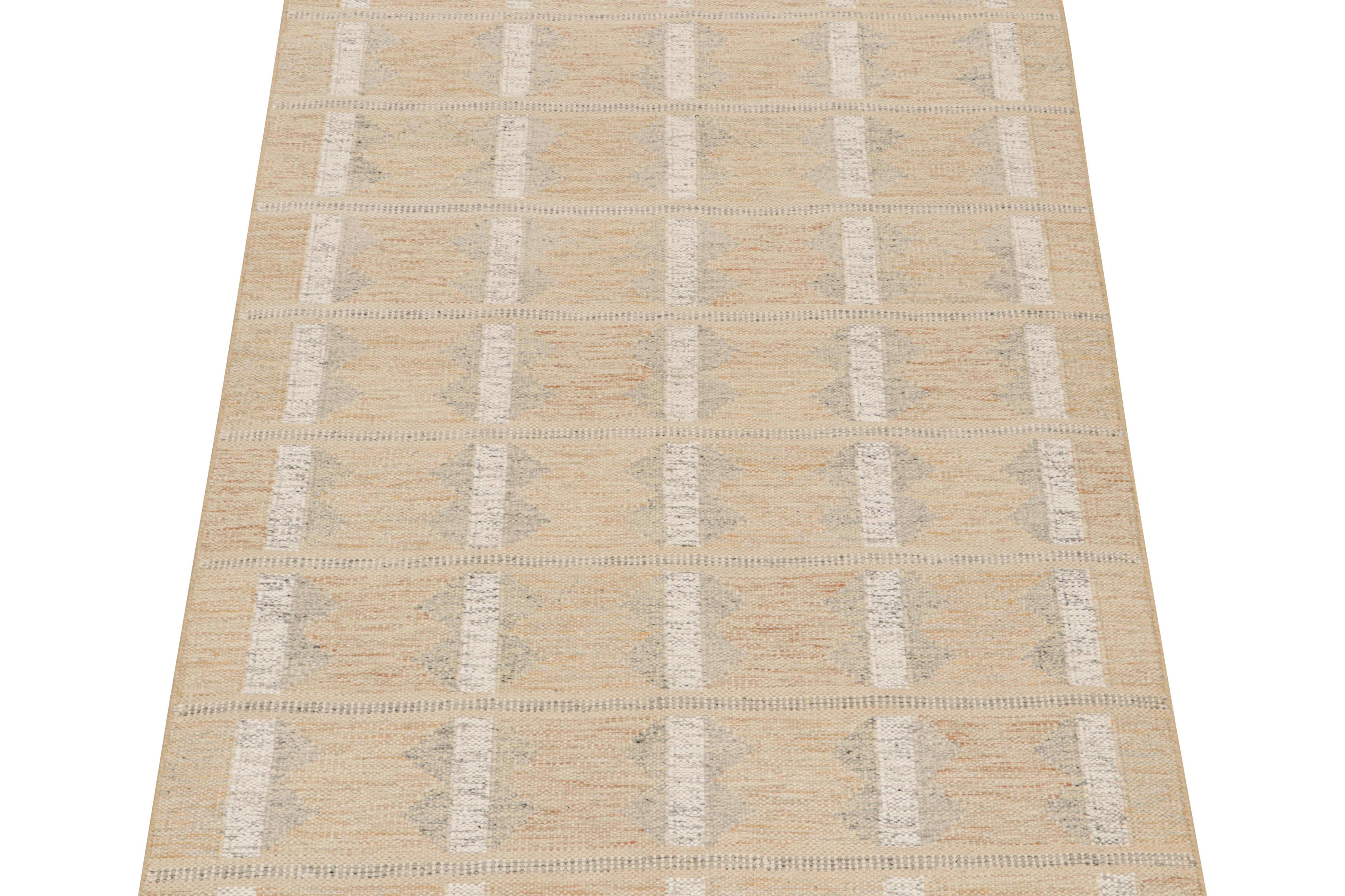 This 5x7 flat weave is a new addition to the Scandinavian Kilim collection by Rug & Kilim. Handwoven in wool and natural yarns, its design reflects a contemporary take on midcentury Rollakans and Swedish Deco style.

On the Design:

This new