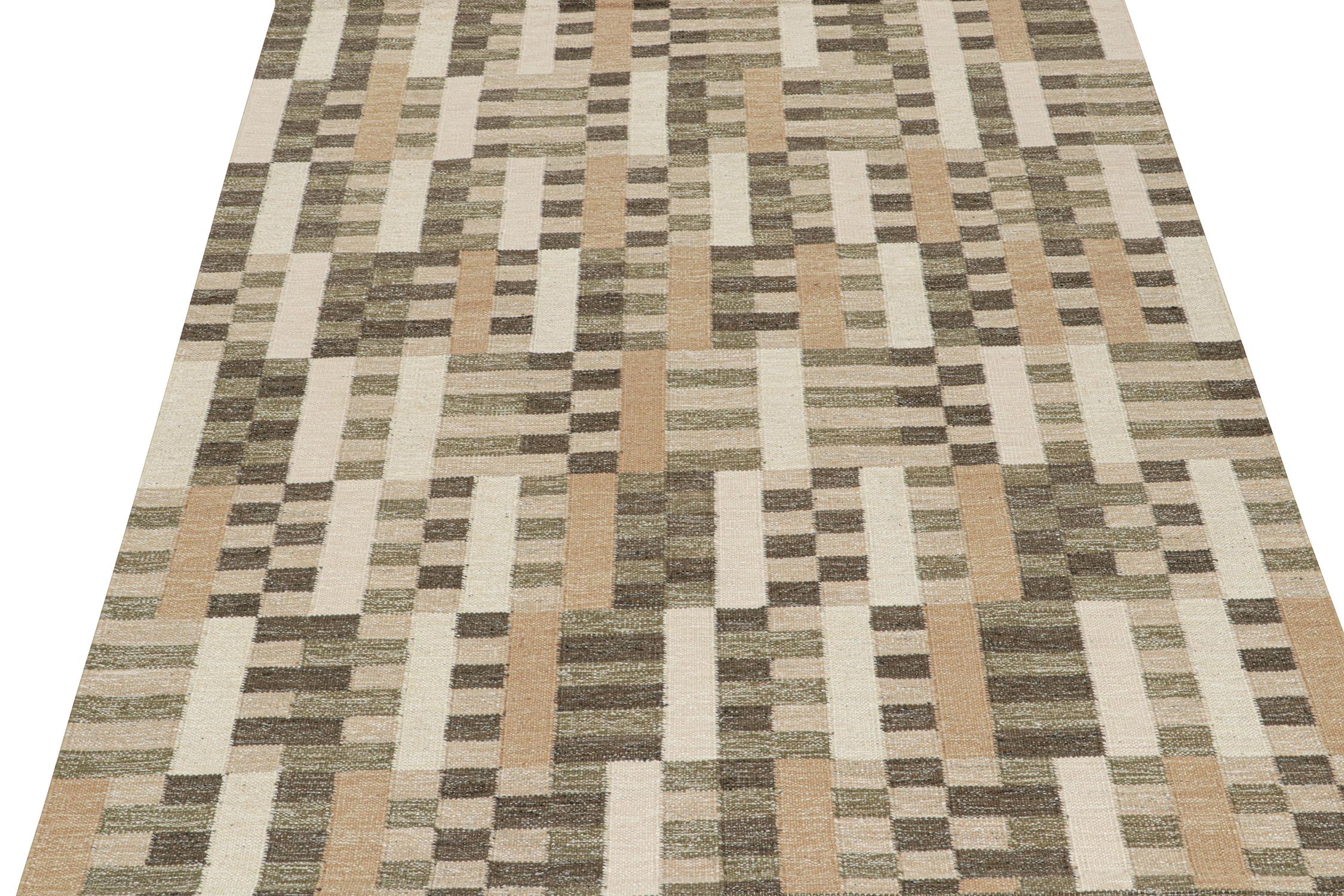 This 8x10 flat weave is a new addition to the Scandinavian Kilim collection by Rug & Kilim. Handwoven in wool and natural yarns, its design reflects a contemporary take on mid-century Rollakans and Swedish Deco style.

On the Design:

This new flat