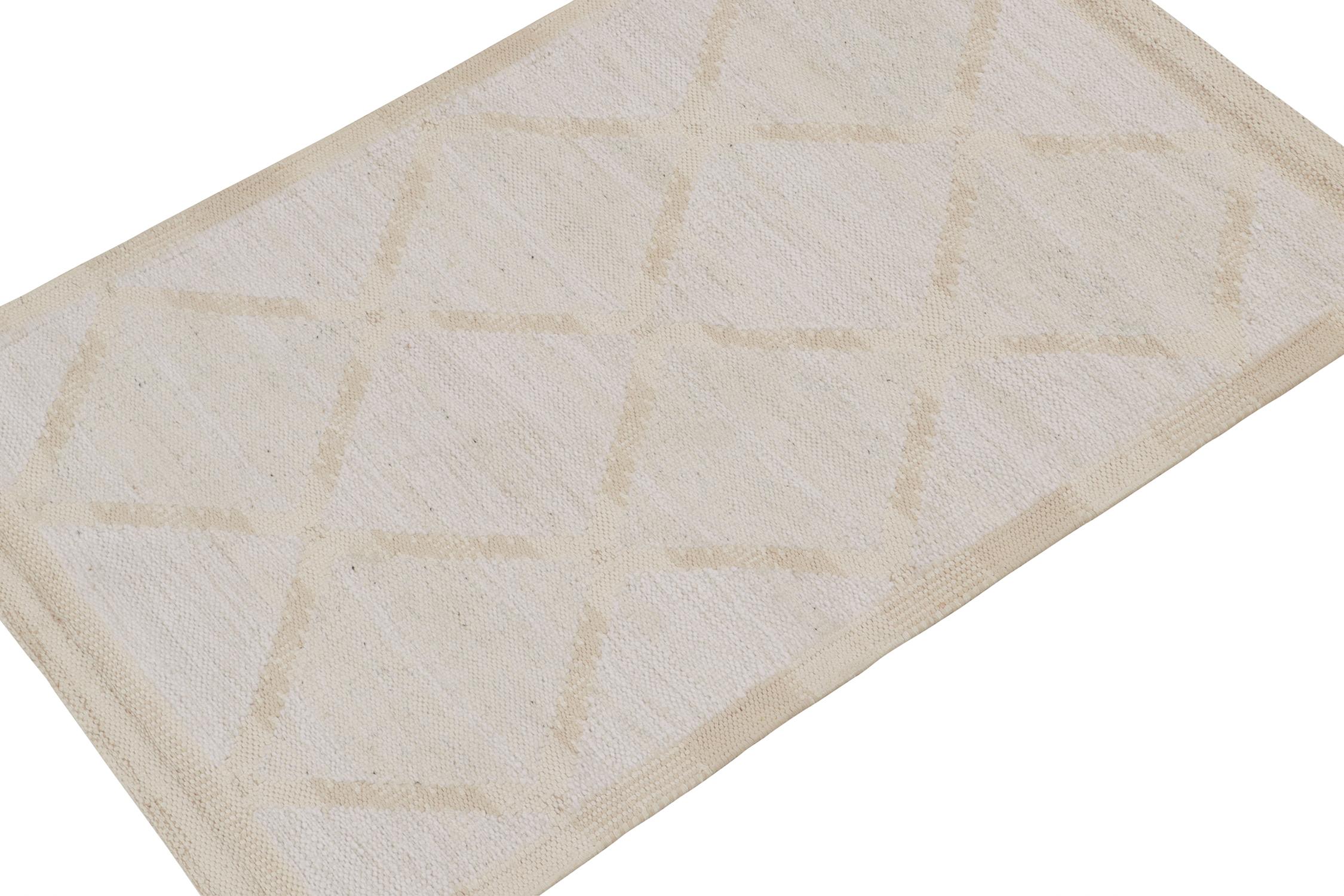 A smart 3x5 Swedish style kilim from Rug & Kilim’s award-winning Scandinavian flat weave collection. Handwoven in wool. 
On the Design: 
This rug enjoys a gorgeous natural movement with elegant diamond lattice patterns in bright white and beige