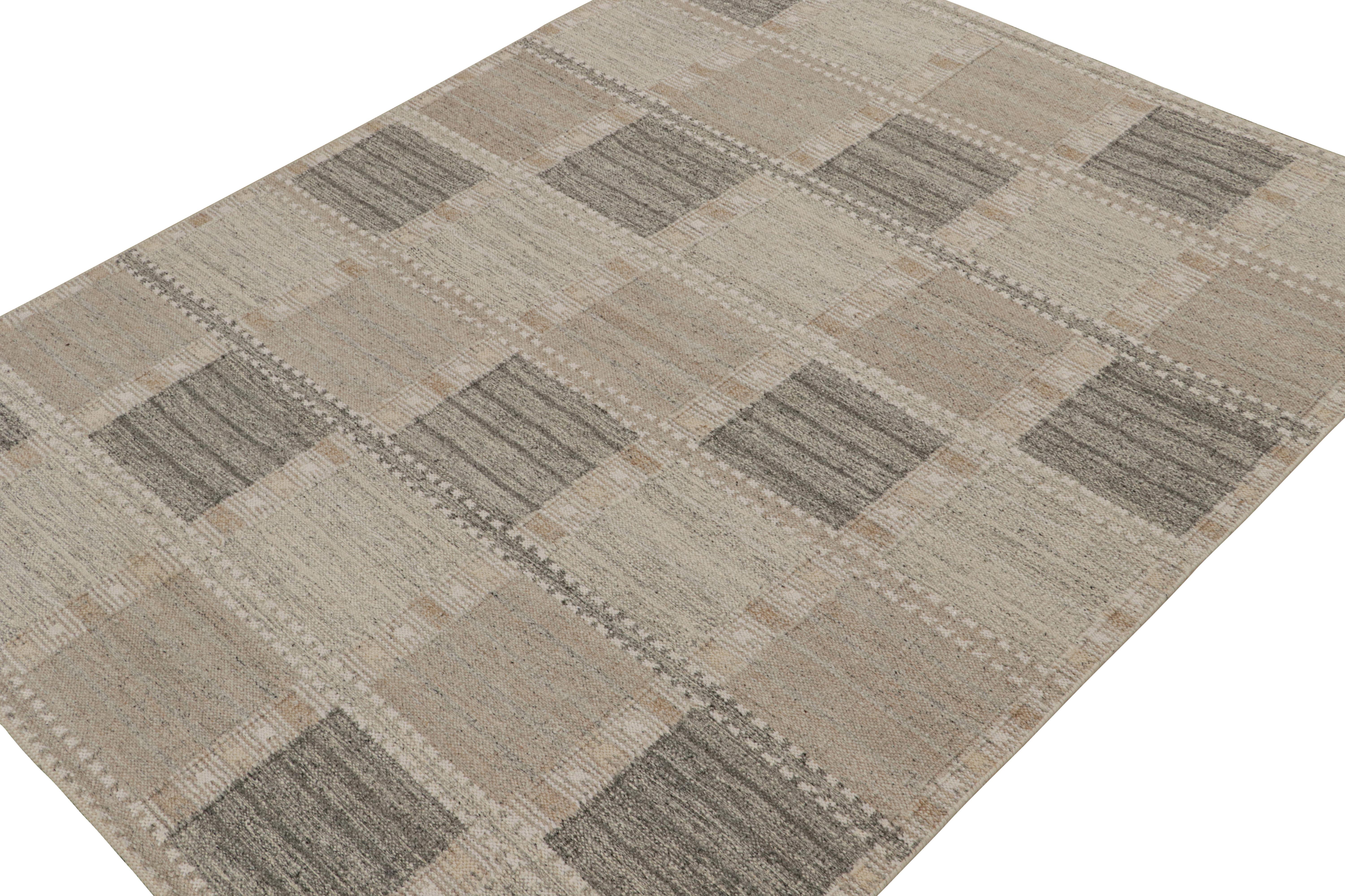 This 8x10 flat weave rug is a new addition to the Scandinavian Kilim collection by Rug & Kilim. Handwoven in wool, cotton and natural yarns, its design reflects a contemporary take on mid-century Rollakans and Swedish Deco style.

On the
