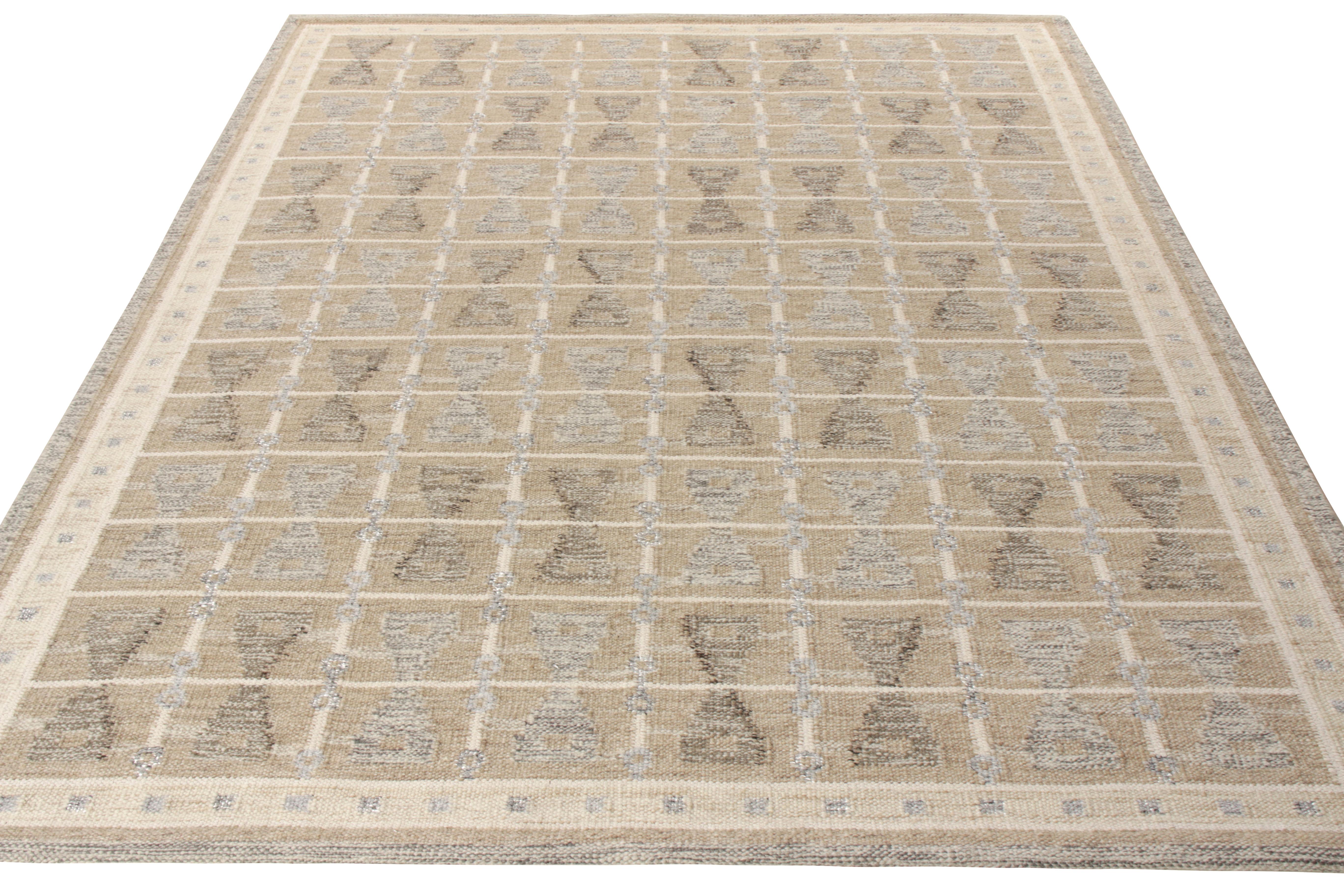 A 8x10 addition to Rug & Kilim’s award-winning Scandinavian flat weave collection. Featuring a symmetric geometric pattern in beige-brown, white and gray, the rug enjoys a scintillating sense of movement with a visually arresting appeal in this