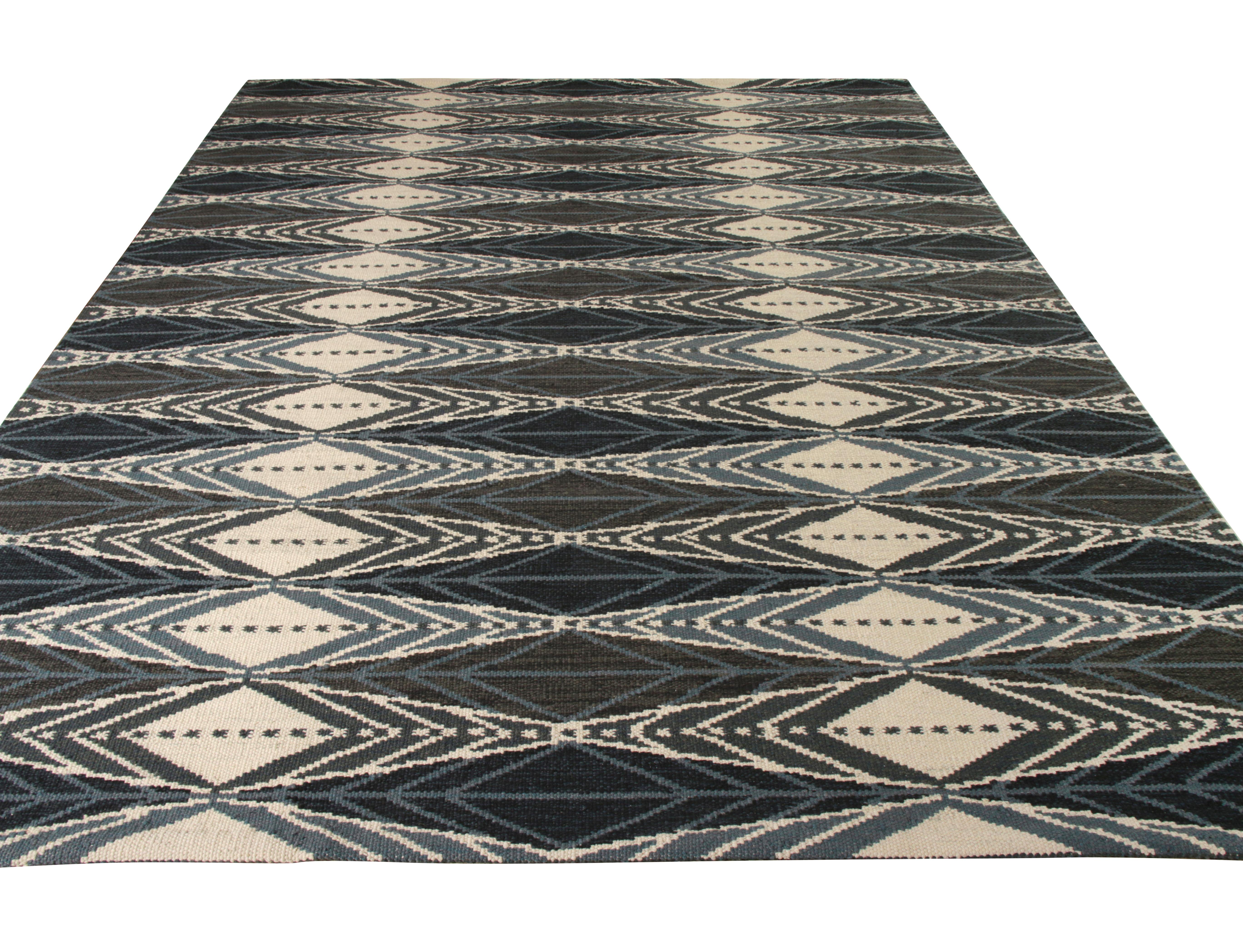 A 9 x 11 Kilim rug from Rug & Kilim’s Scandinavian Nu—the latest unique texture added to the award-winning collection. The blissful unison of a symmetric geometric pattern in sophisticated hues of blue and gray create a mesmerizing illusion with