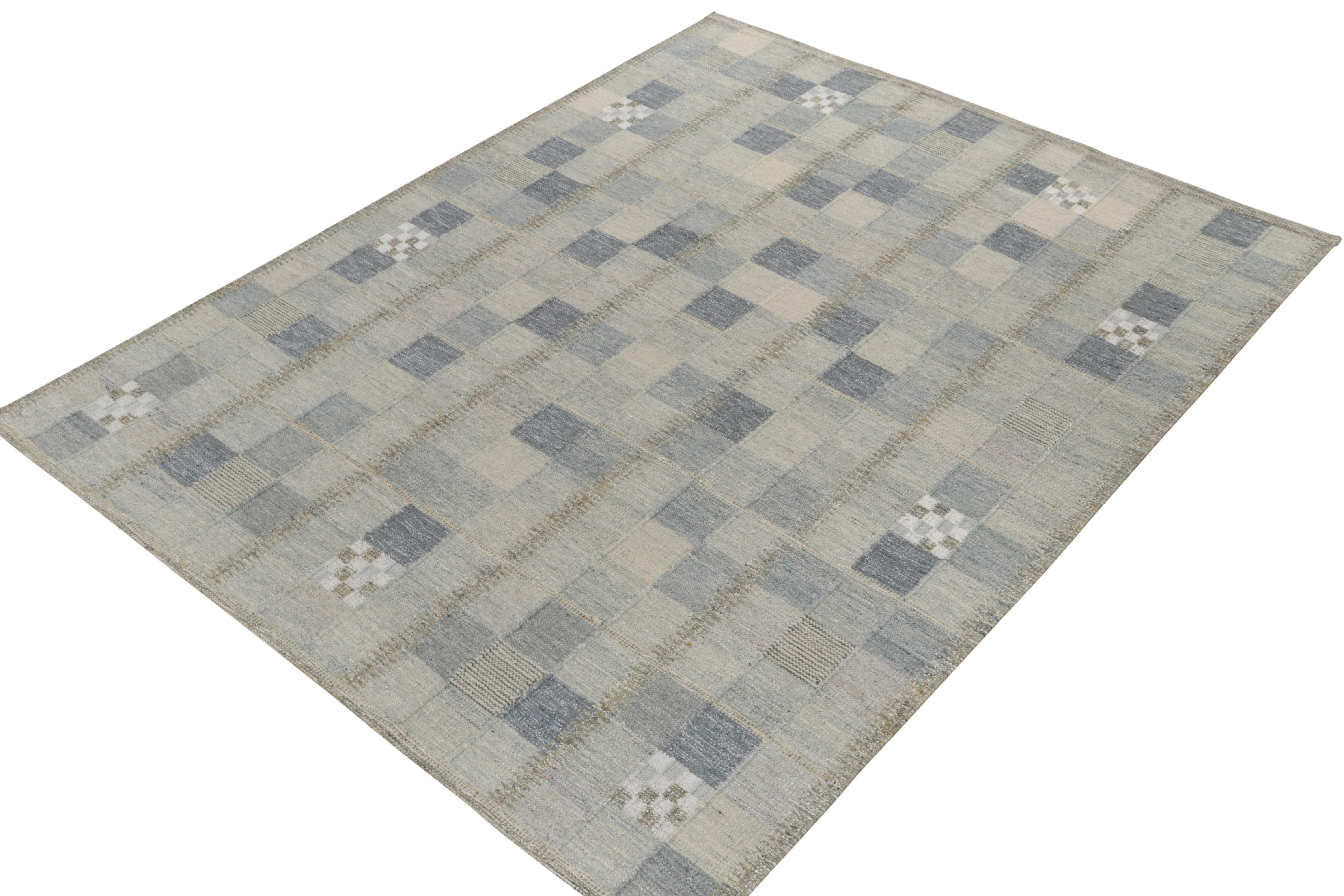 Exemplifying a modern take on Swedish styles, a 9x12 flat weave from Rug & Kilim’s award-winning Scandinavian Kilim collection. The handwoven rug enjoys a smart application of geometry with well defined compartmentalisation entwining variegated