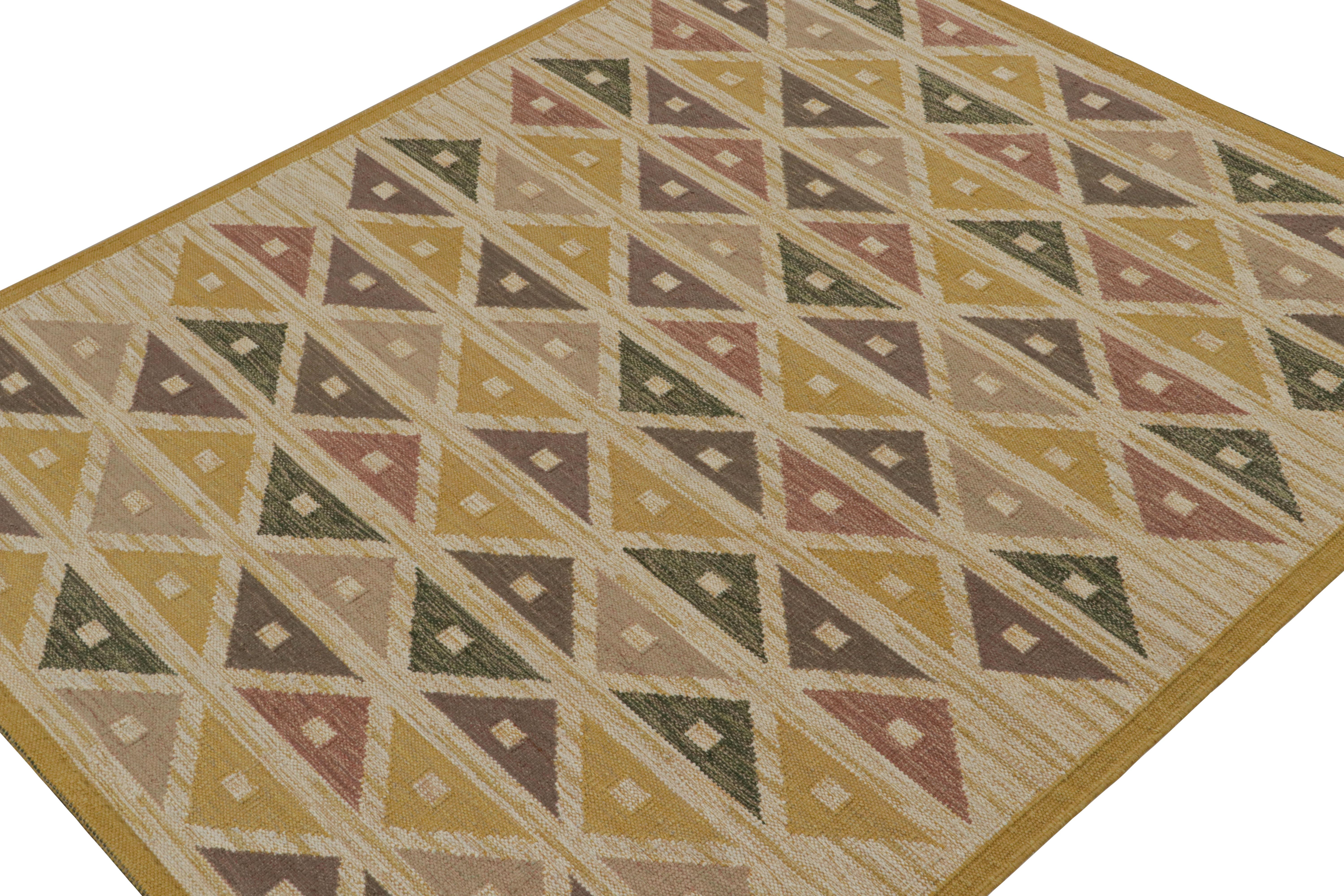 An 8x10 Swedish style kilim from our award-winning Scandinavian flat weave collection. Handwoven in wool, cotton & undyed natural yarns

On the Design: 

This rug enjoys geometric patterns in gold, red & brown. Keen eyes will admire undyed, natural