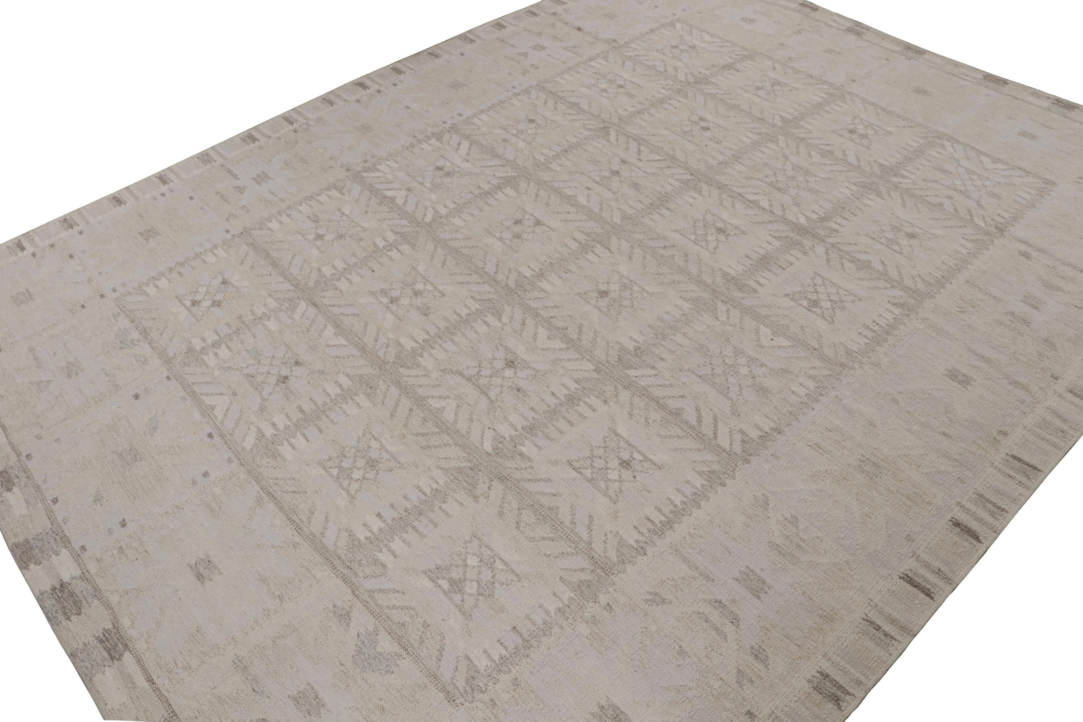 A smart 12x16 Swedish style kilim from our award-winning Scandinavian flat weave collection. Handwoven in wool, natural yarns and some accents of silk.

On the Design: 

This rug enjoys geometric patterns in gray white with ivory accents. Keen eyes