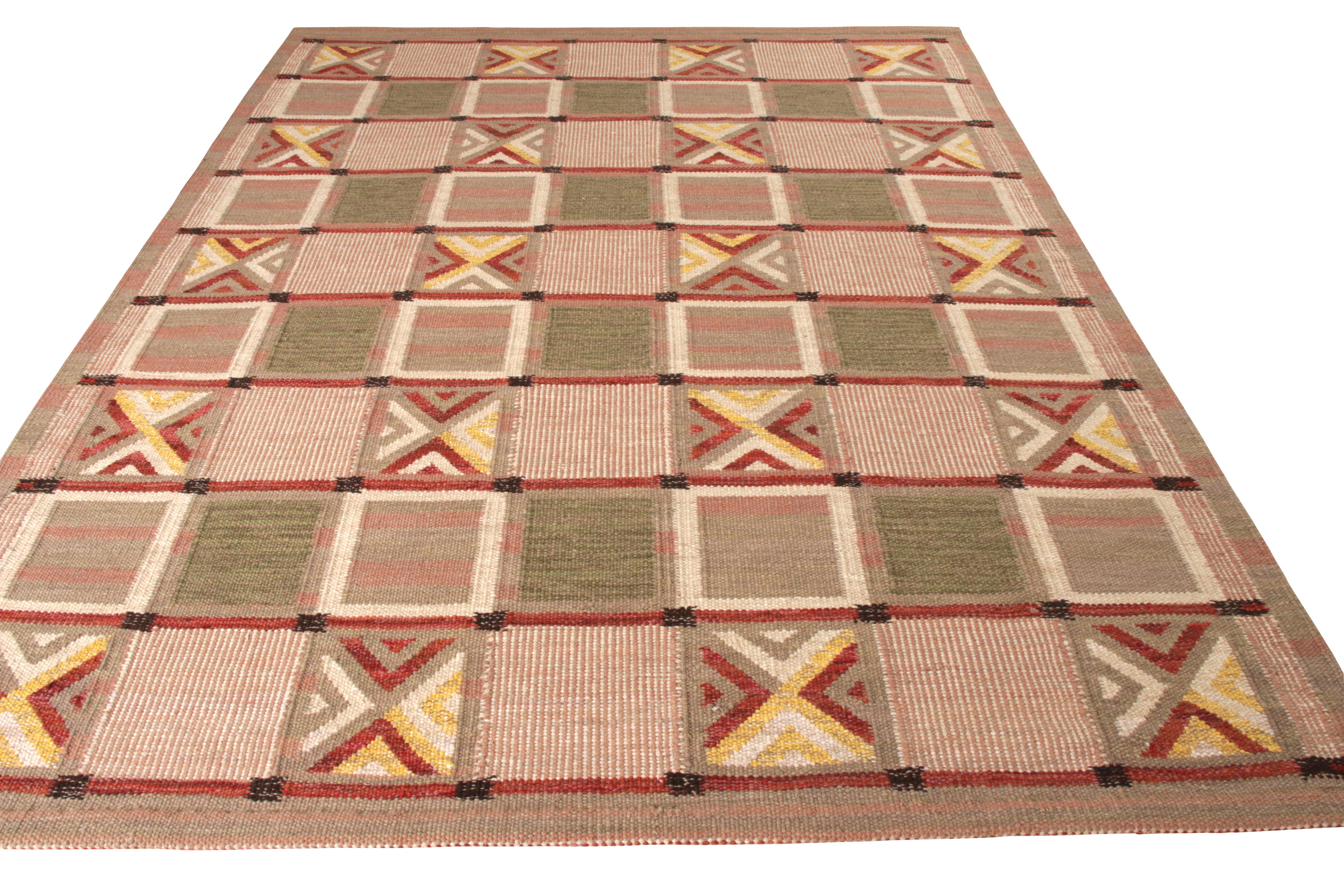 A coveted entrant to Rug & Kilim’s Scandinavian Collection, this 8x10 Kilim rug enjoys an audacious geometric pattern that lends a notable sense of movement in gracious scale. With soft beige tones playing in the pink background, the blend of darker