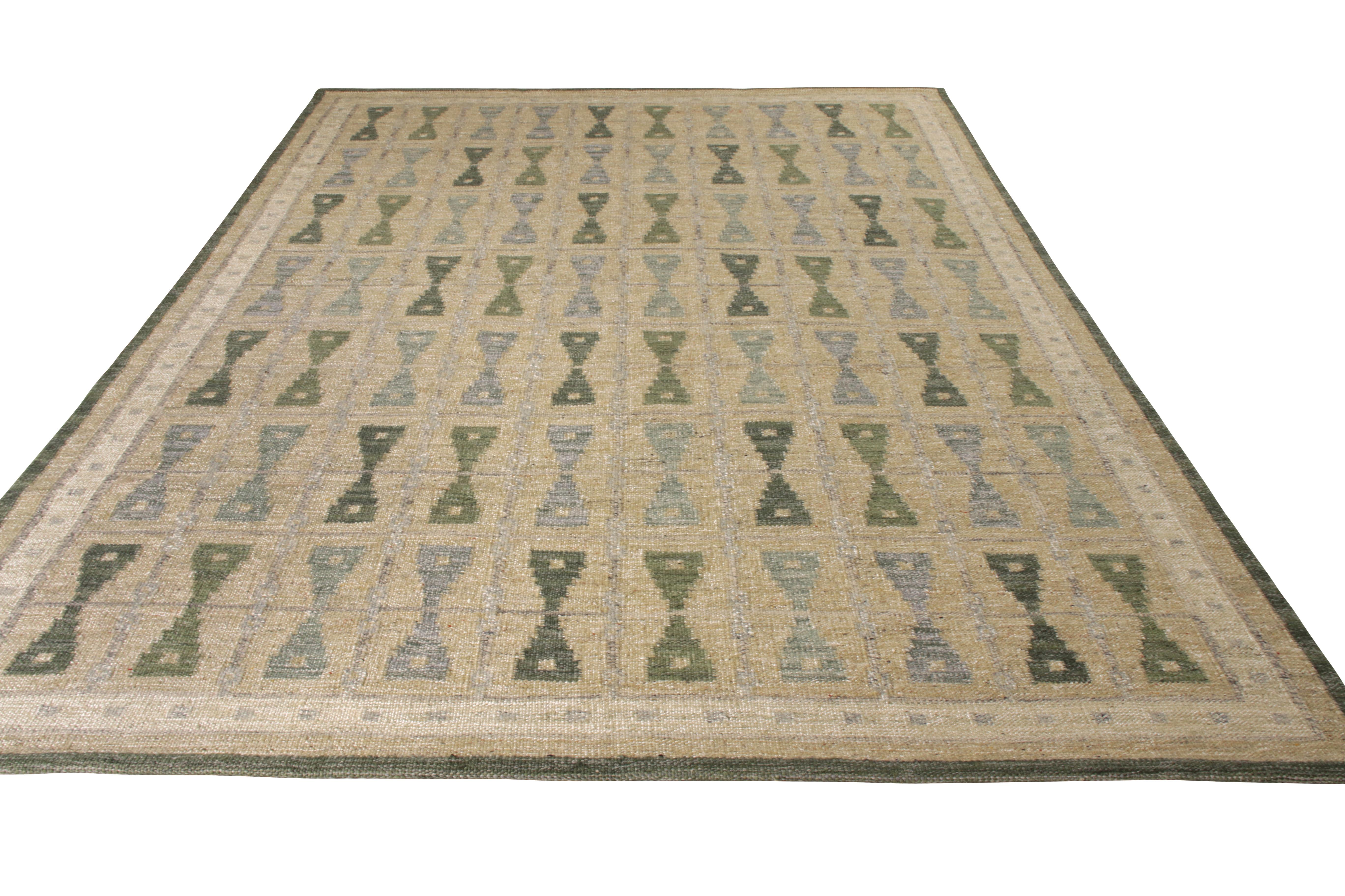 Sized at 9 x 12, this hand-knotted wool Kilim rug is a graceful addition to the Scandinavian Collection by Rug and Kilim. Inspired by intricate mid century Swedish geometric patterns, this flat weave enjoys soothing tones of beige, green and grey