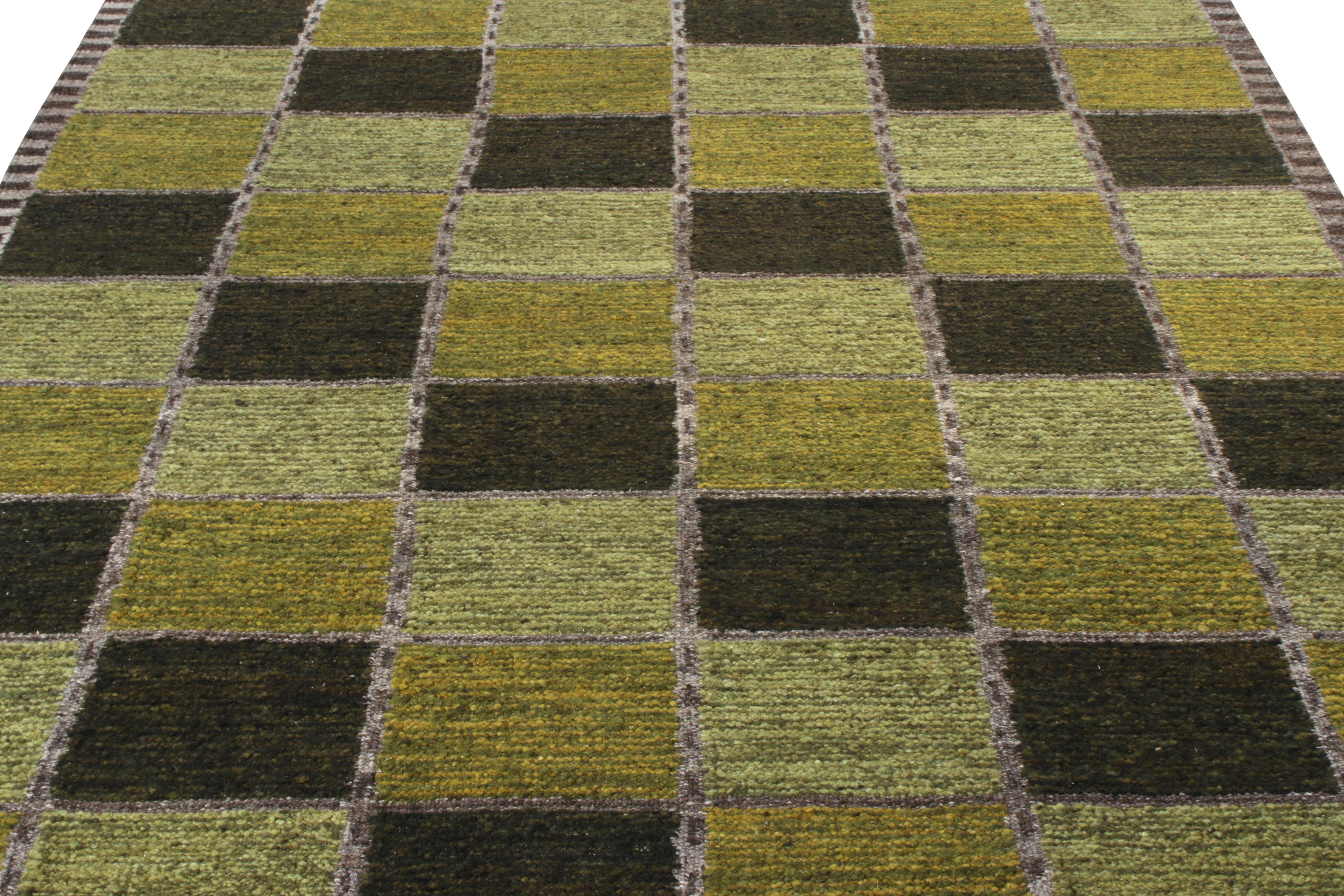 Rug & Kilim présente ce tissage plat de la Collection Scandinavian Nu (9x12). Réalisé avec un fil unique filé à la main dans la laine tissée, ce chef-d'œuvre de style suédois présente un motif géométrique symétrique dans une combinaison idyllique de