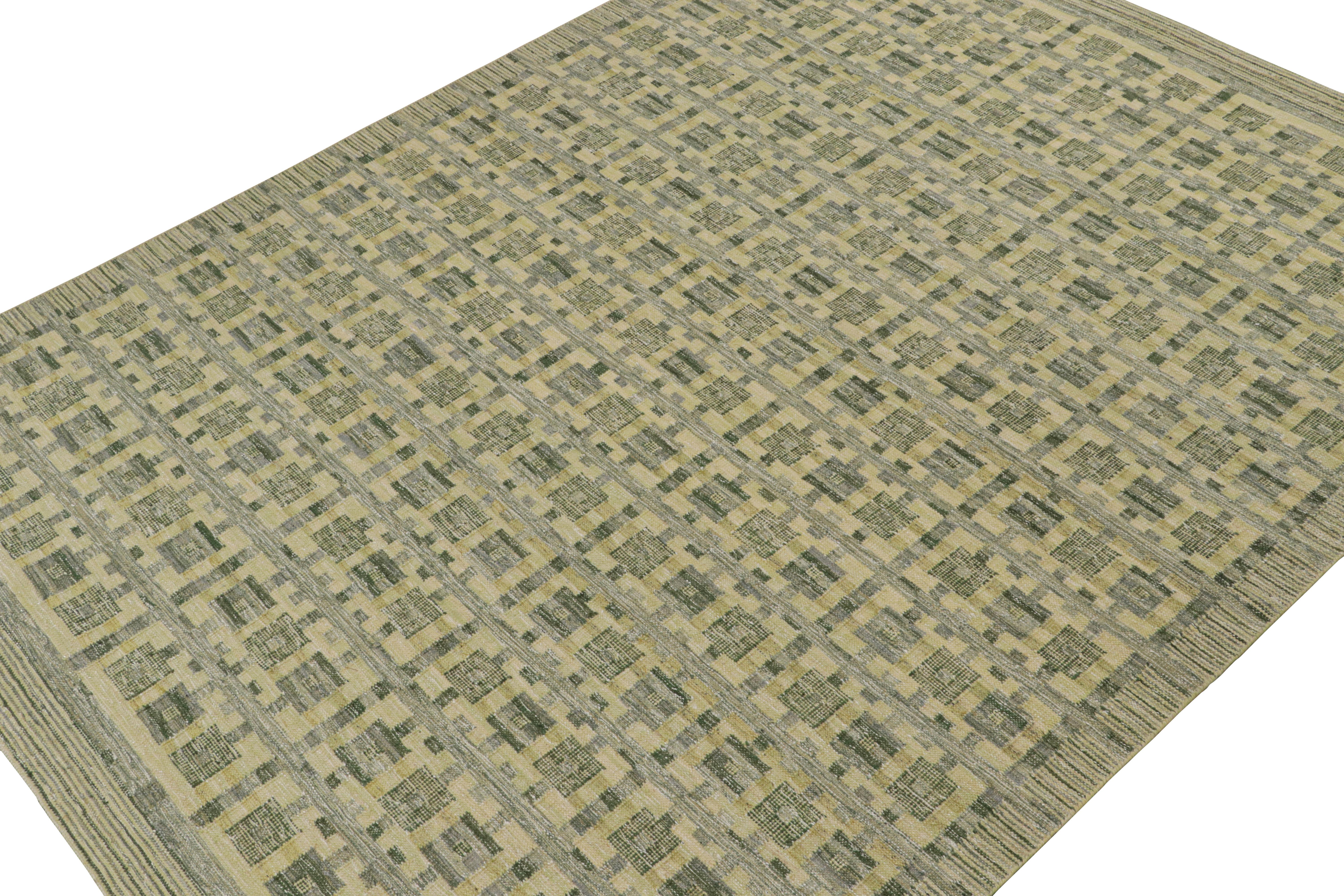 Ce tapis Kilim 9x12 est issu de la ligne flatweave de la collection de tapis scandinaves de Rug & Kilim. Tissé à la main en laine, coton et fils naturels, son design est une reprise moderne des tapis Rollakhan et Rya dans le style déco suédois.