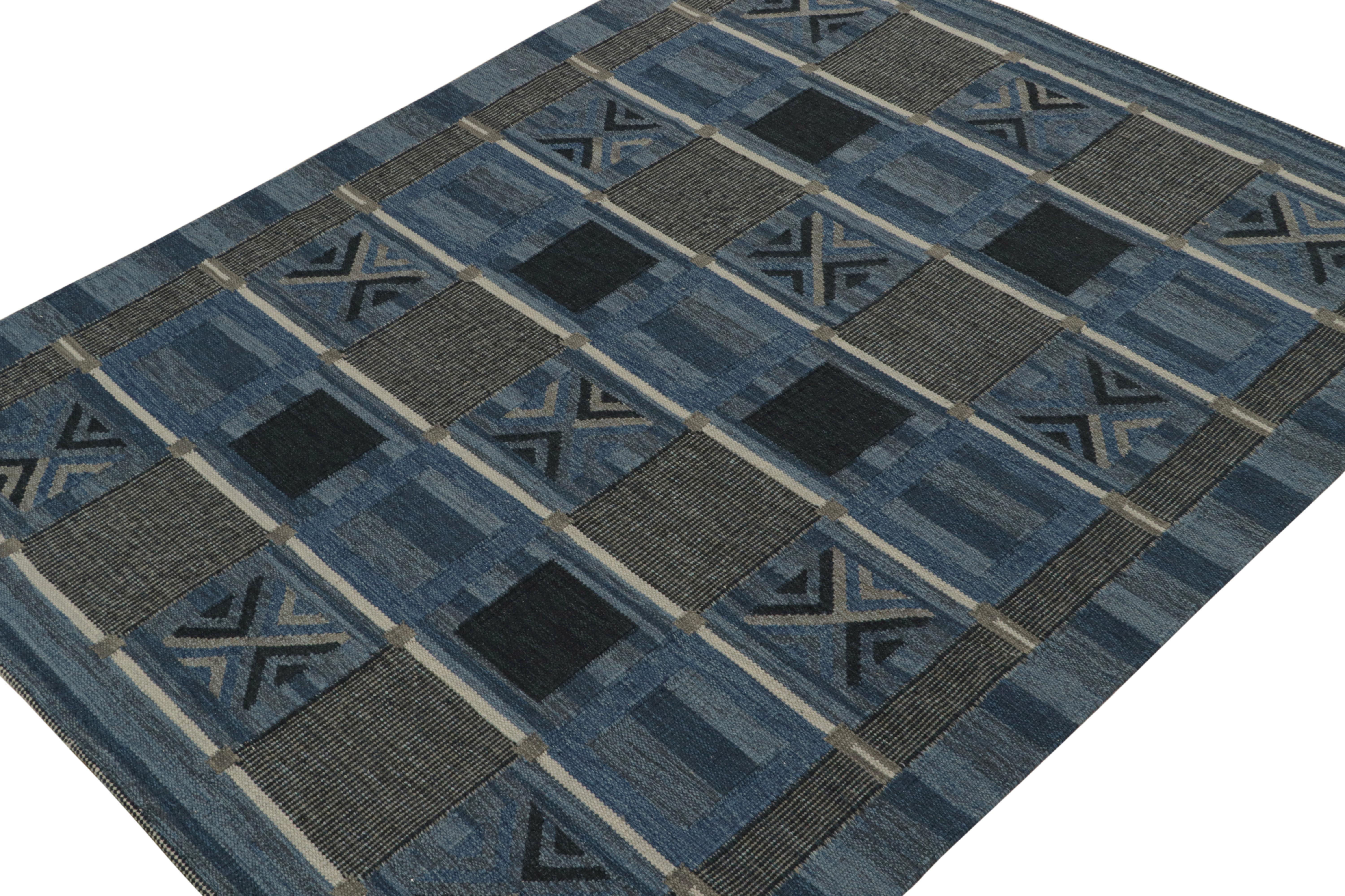 A smart 8x10 Swedish style kilim from our award-winning Scandinavian flat weave collection. Handwoven in wool, cotton & undyed natural yarns

On the Design: 

This rug enjoys geometric patterns in tones of blue & gray. Keen eyes will admire undyed,