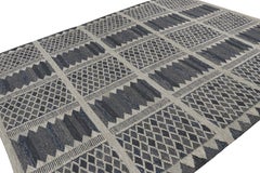 Rug & Kilim's Teppich im skandinavischen Stil mit blau-grauen Mustern