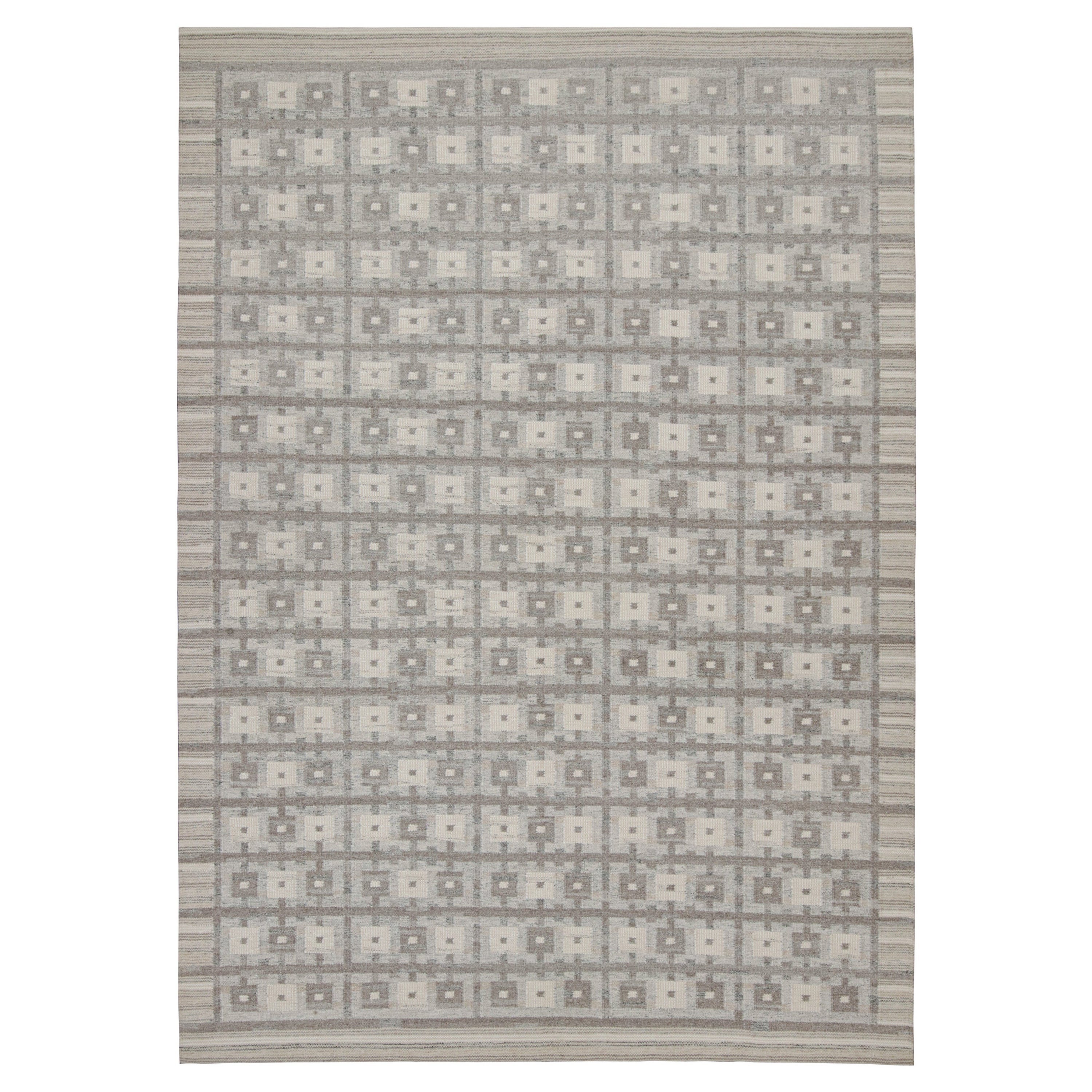 Rug
Kilim
s skandinavischer Kilimteppich mit grauem und beigem geometrischem Muster