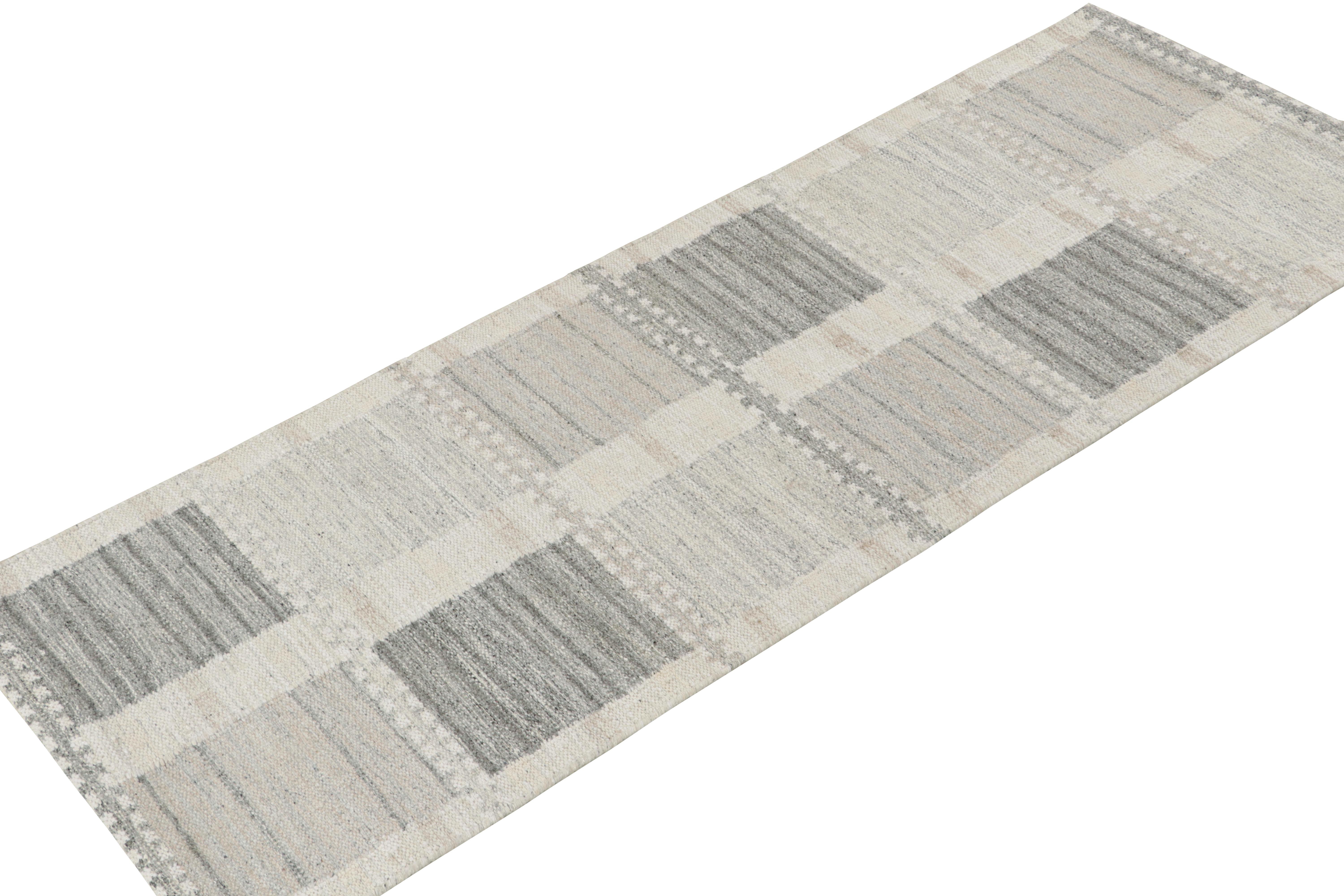 A smart 3x8 Swedish style kilim runner from our award-winning Scandinavian flat weave collection. Handwoven in natural yarn. 

On the Design: 

This rug enjoys a unique texture married to geometric patterns in crisp white and gray. Keen eyes