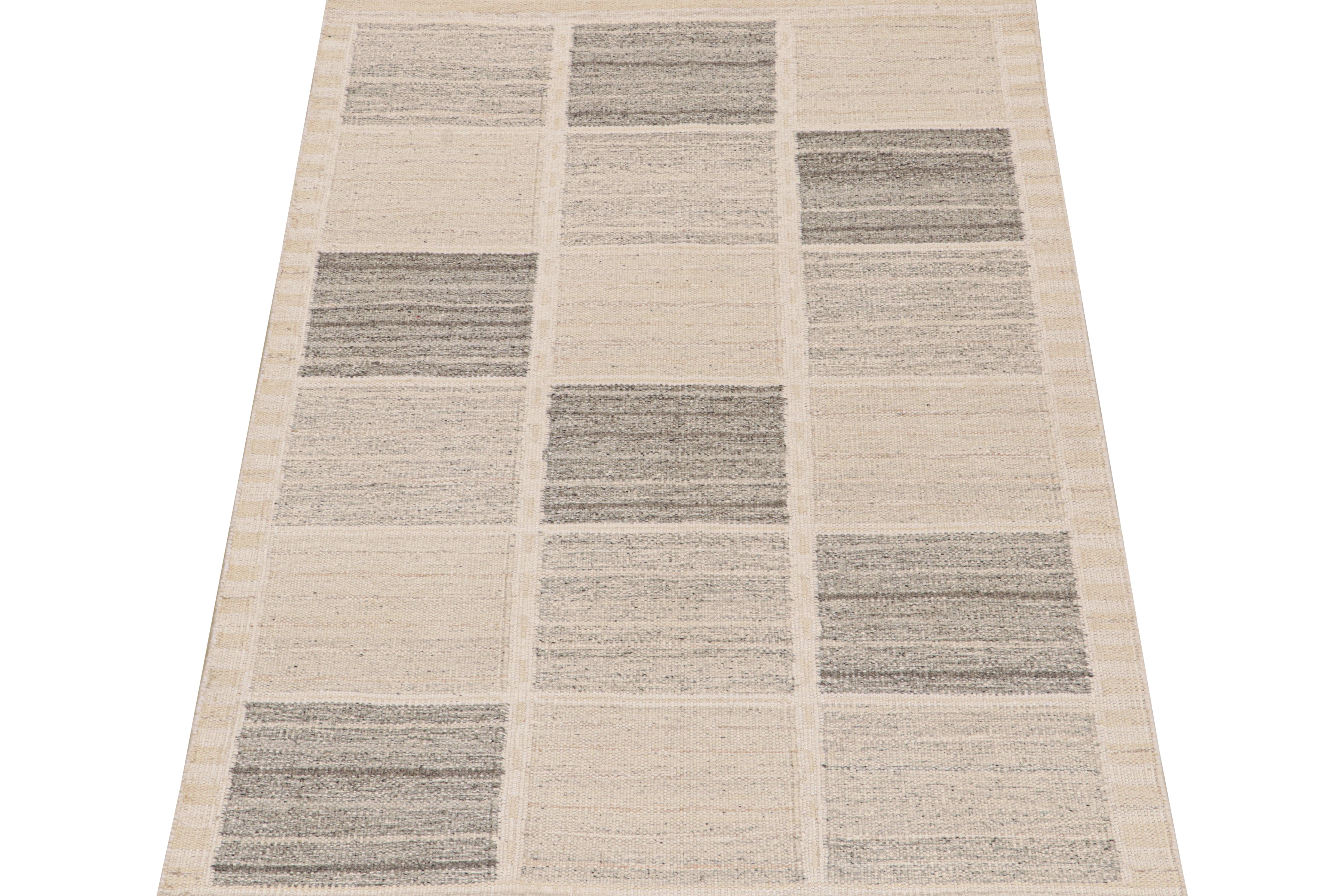 This 5x7 flat weave is a new addition to the Scandinavian Kilim collection by Rug & Kilim. Handwoven in wool and natural yarns, its design reflects a contemporary take on mid-century Rollakans and Swedish Deco style.

On the Design:

This new