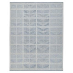 Kilim de style scandinave avec motifs géométriques bleus et argentés de Rug
Kilim