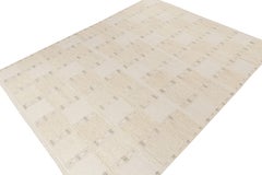 Rug & Kilim è un kilim in stile scandinavo con motivi geometrici color grigio e beige.