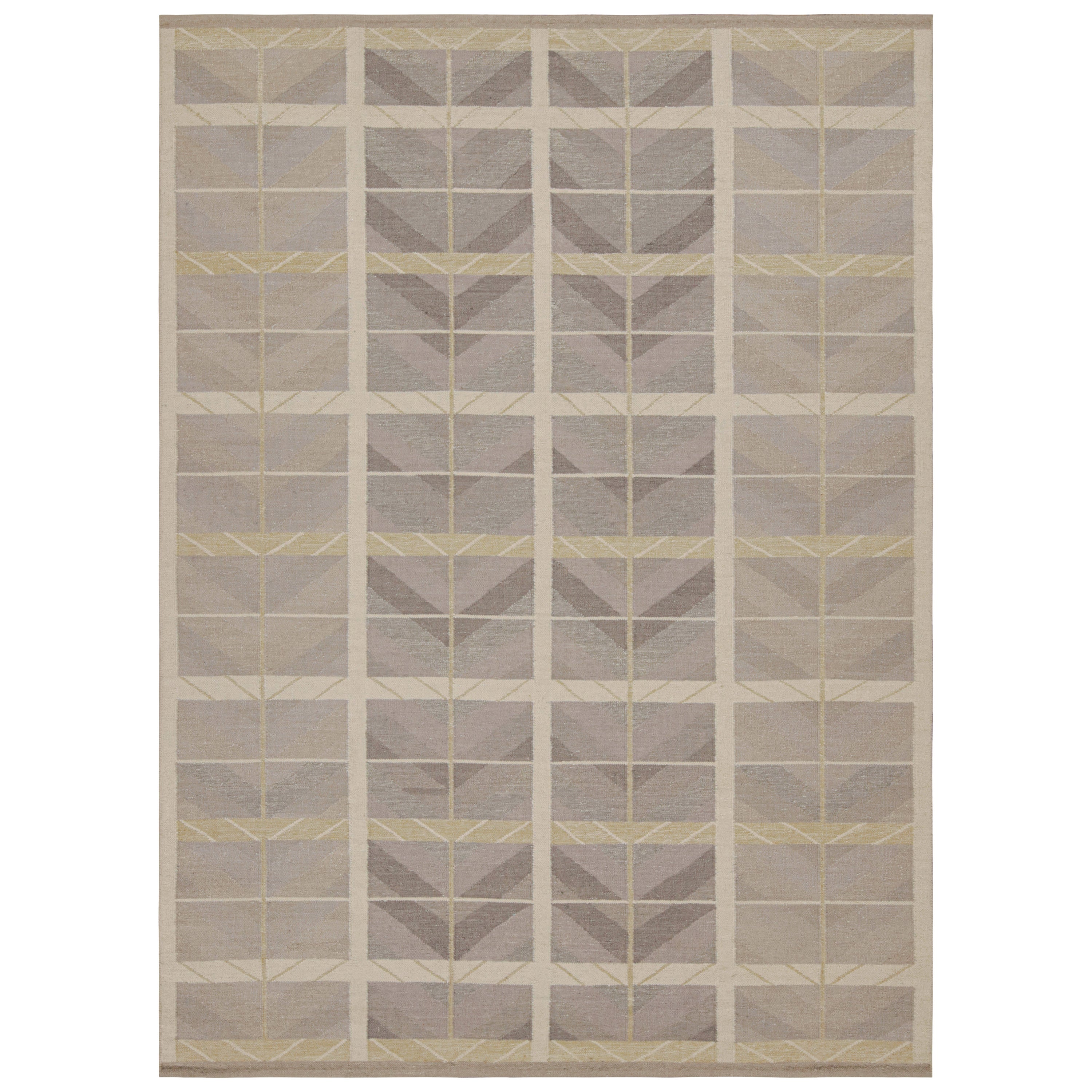 Rug & Kilim è un kilim in stile scandinavo con motivi geometrici e chevrons color grigio scuro.