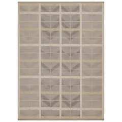 Rug & Kilim è un kilim in stile scandinavo con motivi geometrici e chevrons color grigio scuro.