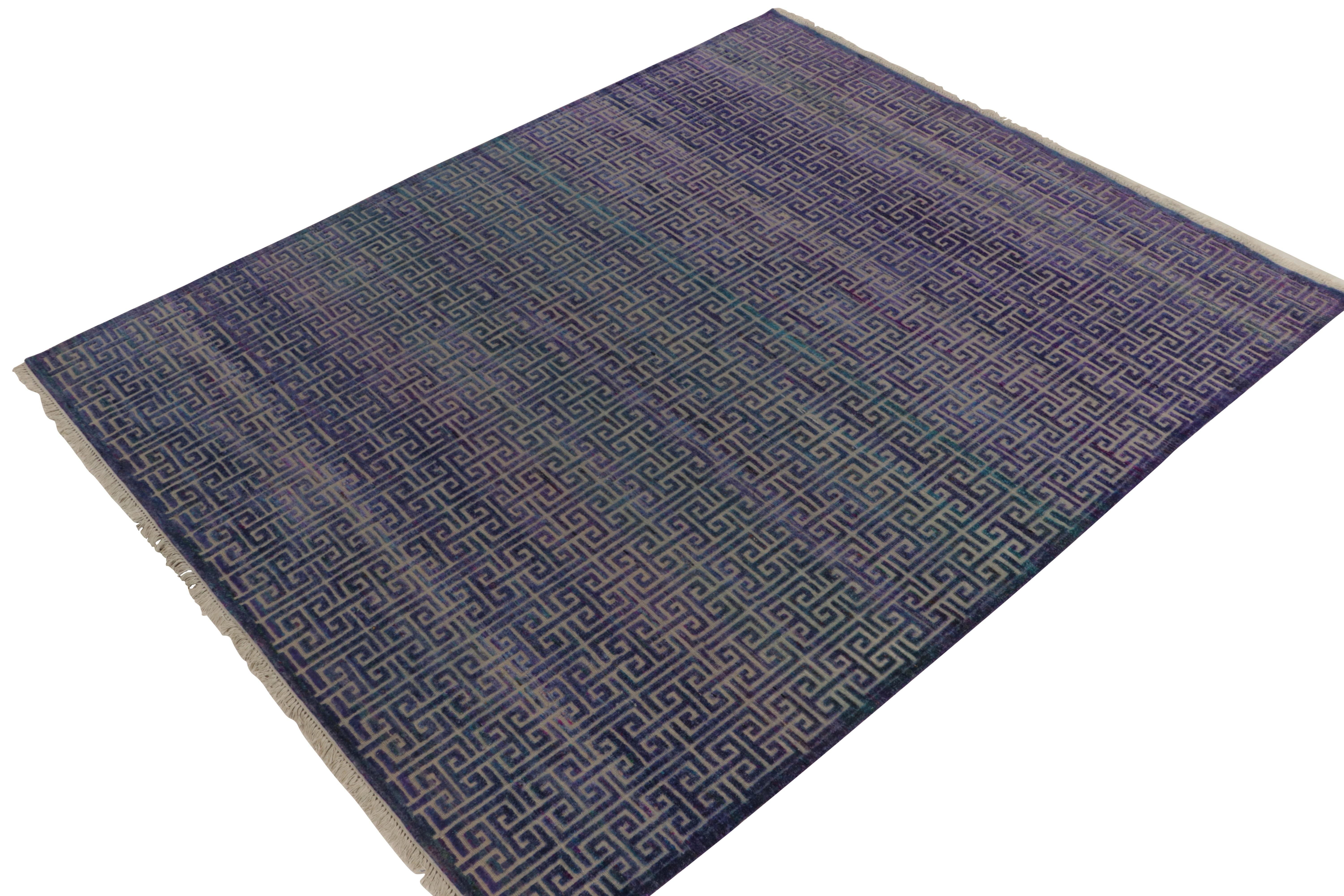 Hand-knotted in a fine blend of wool & silk, an 8x10 contemporary rug from our Modern Classics collection. This particular piece reimagines Swedish Deco geometric patterns in brilliant, modern blue and purple colorways. Keen eyes will admire the