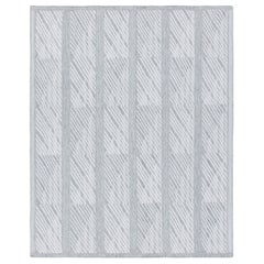 Tapis d
extérieur de style scandinave à motifs géométriques gris et blancs de Rug 
Kilim