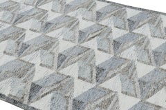 Tapis d'extérieur de style scandinave à motif géométrique bleu et gris de Rug & Kilim