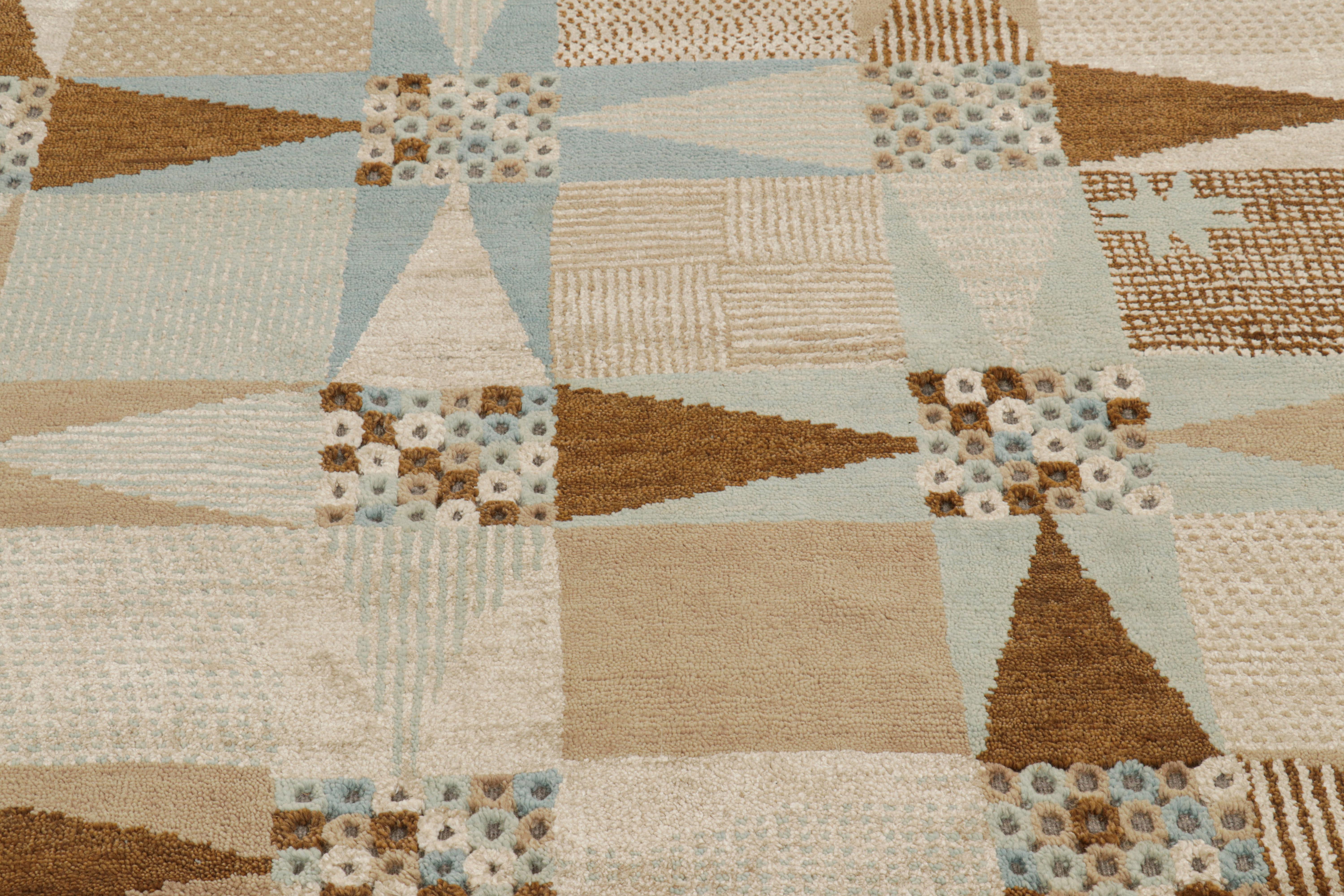 Noué à la main en laine, ce tapis suédois 9x12 de notre texture 