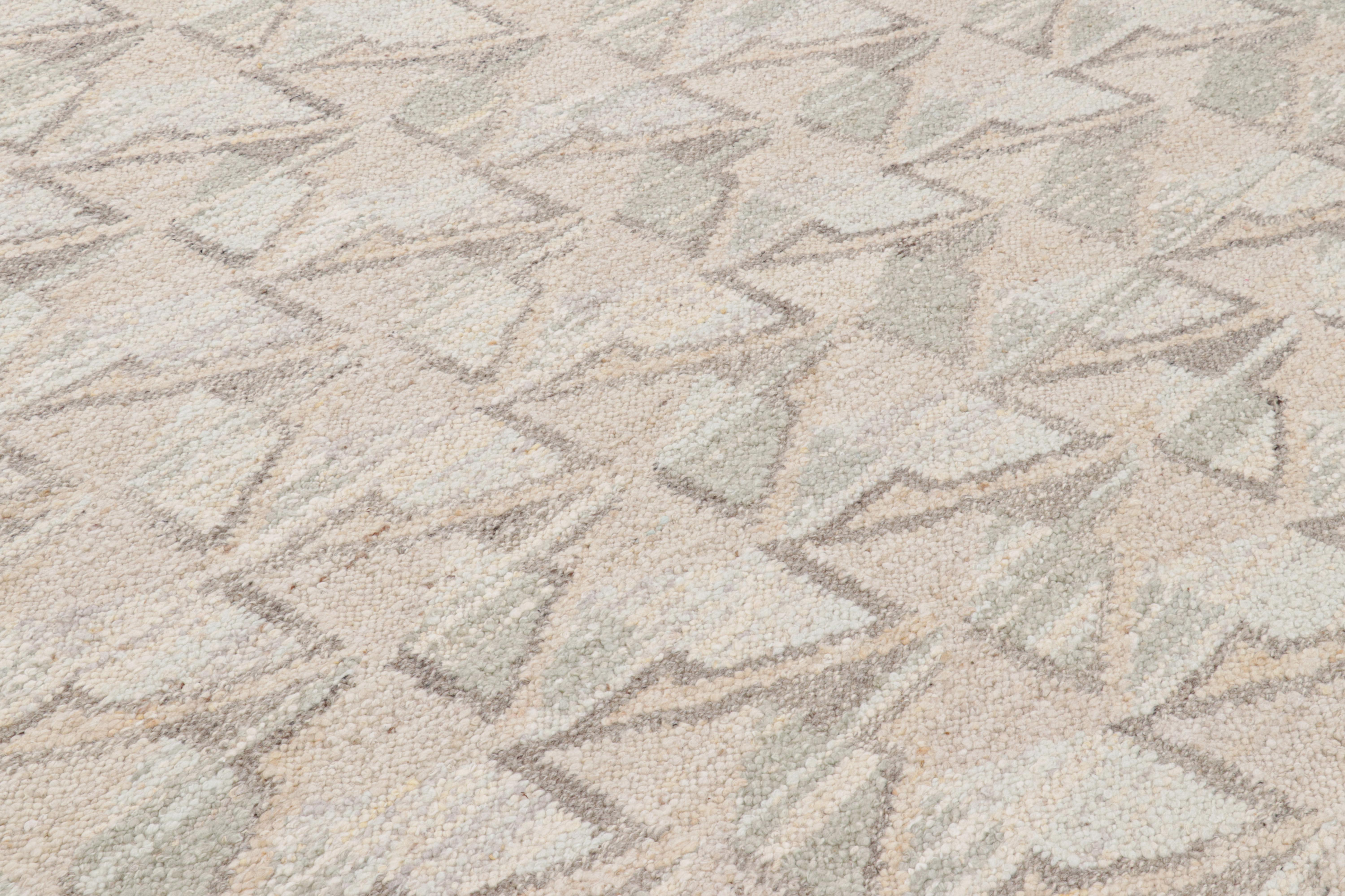 Ce tapis de style suédois 8x10, tissé à la main en laine, est issu de la texture inventive 