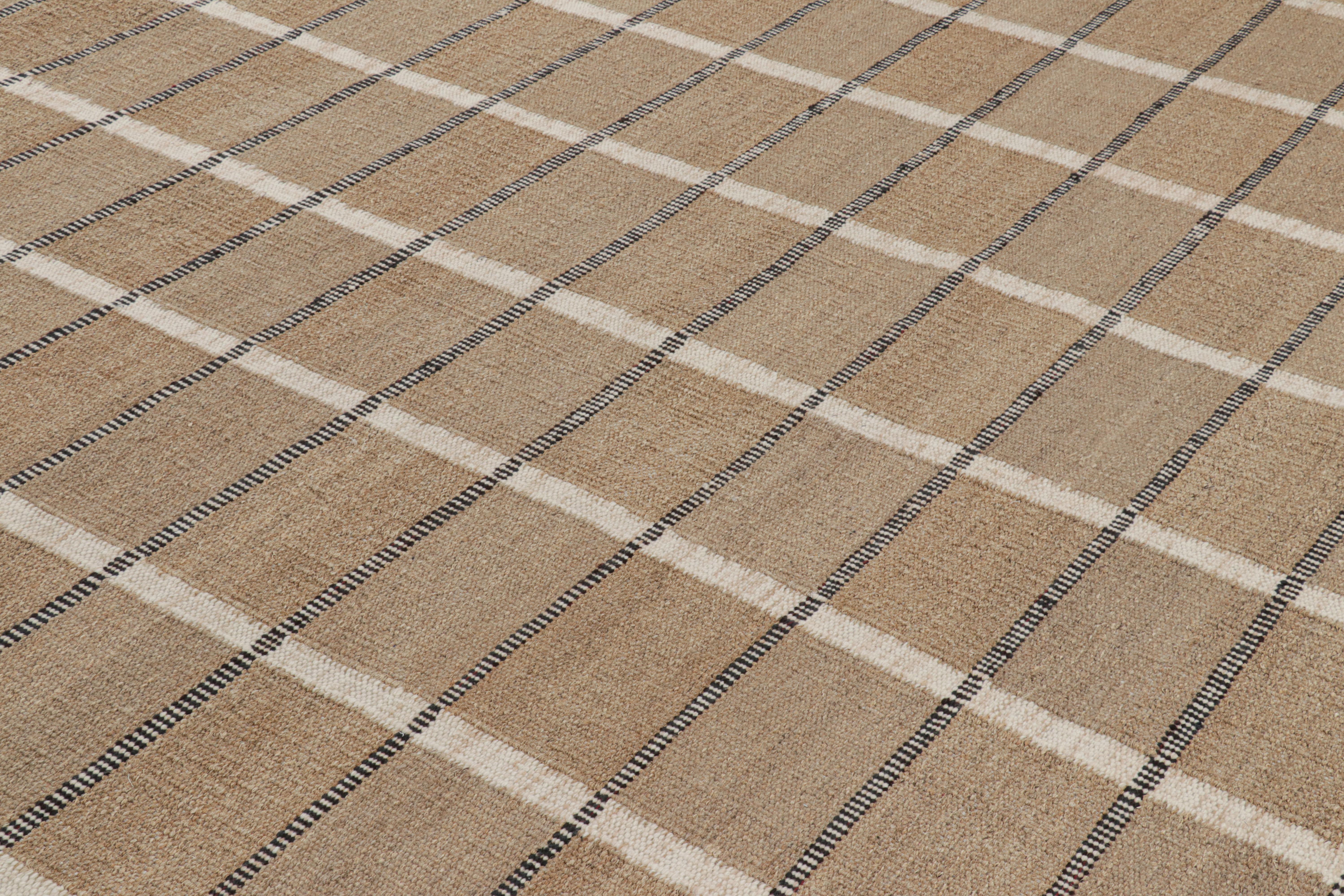 Ce tapis 10x14 de style suédois, tissé à la main en chanvre, fait partie de la ligne Nature de la collection de tapis scandinaves de Rug & Kilim, inspirée par les designs du milieu du siècle de l'esthétique minimaliste acclamée.

Sur le Design :