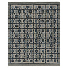 Rug & Kilim’s Scandinavian Style Rug in Beige with Blue Geometric Patterns