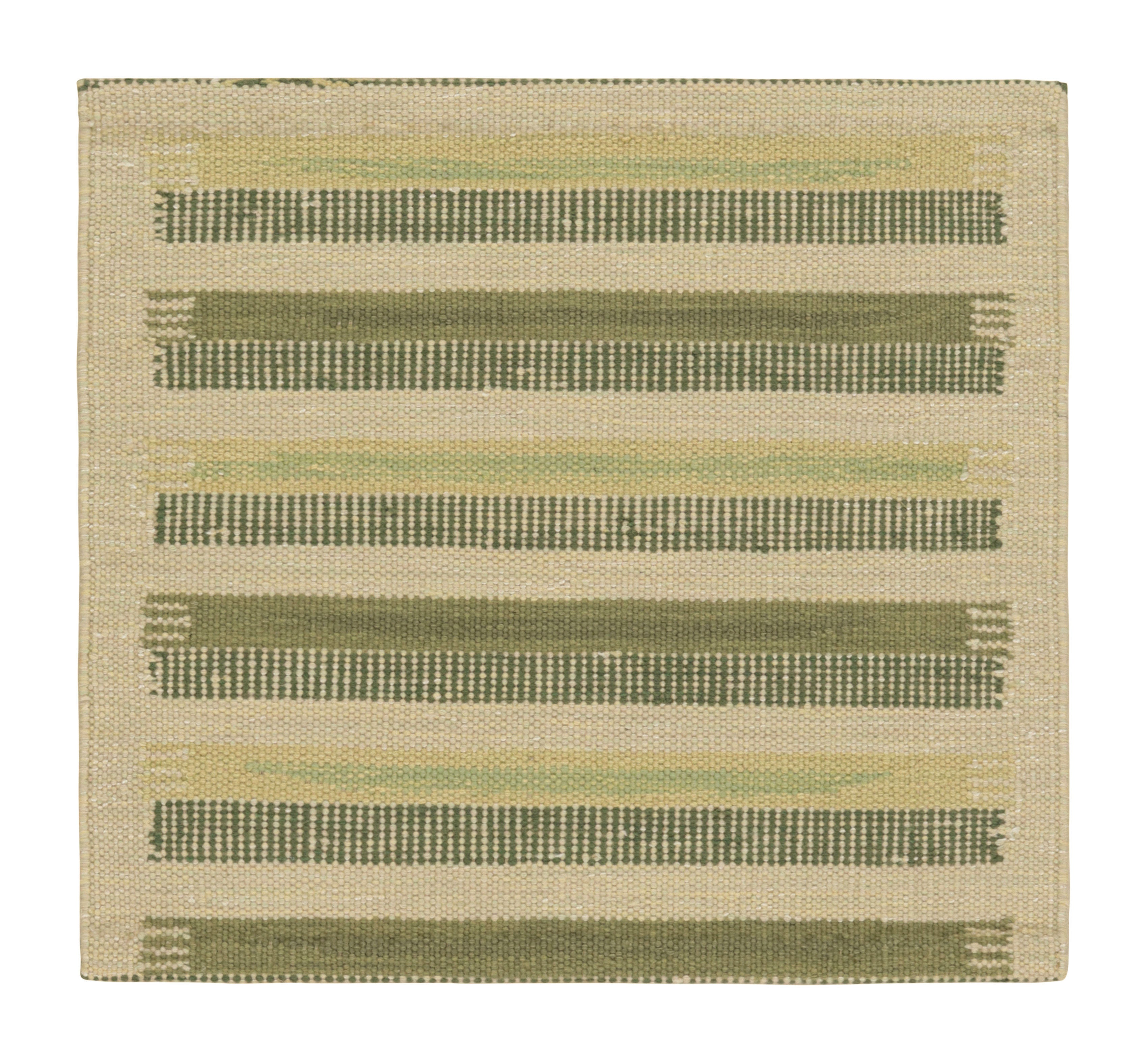 Rug & Kilim’s Scandinavian Style Rug in Beige, with Green Geometric Stripes