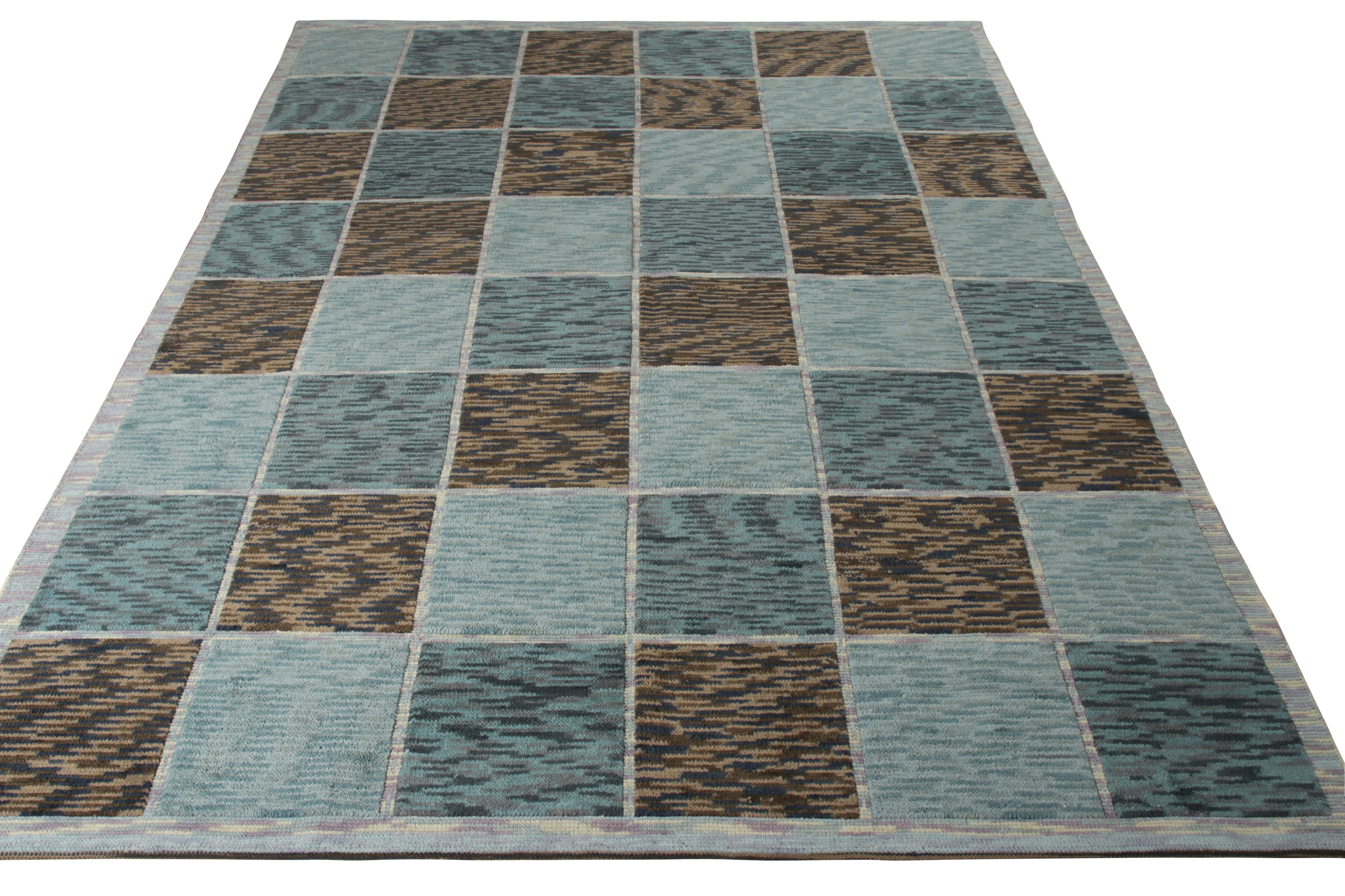 Hand knotted in wool,this modern 9x12 rug is the latest addition to Rug & Kilim’s celebrated Scandinavian Collection. The repeating geometric pattern sits comfortably in a marriage of blue and beige-brown hues with a high-low pile refinement. The