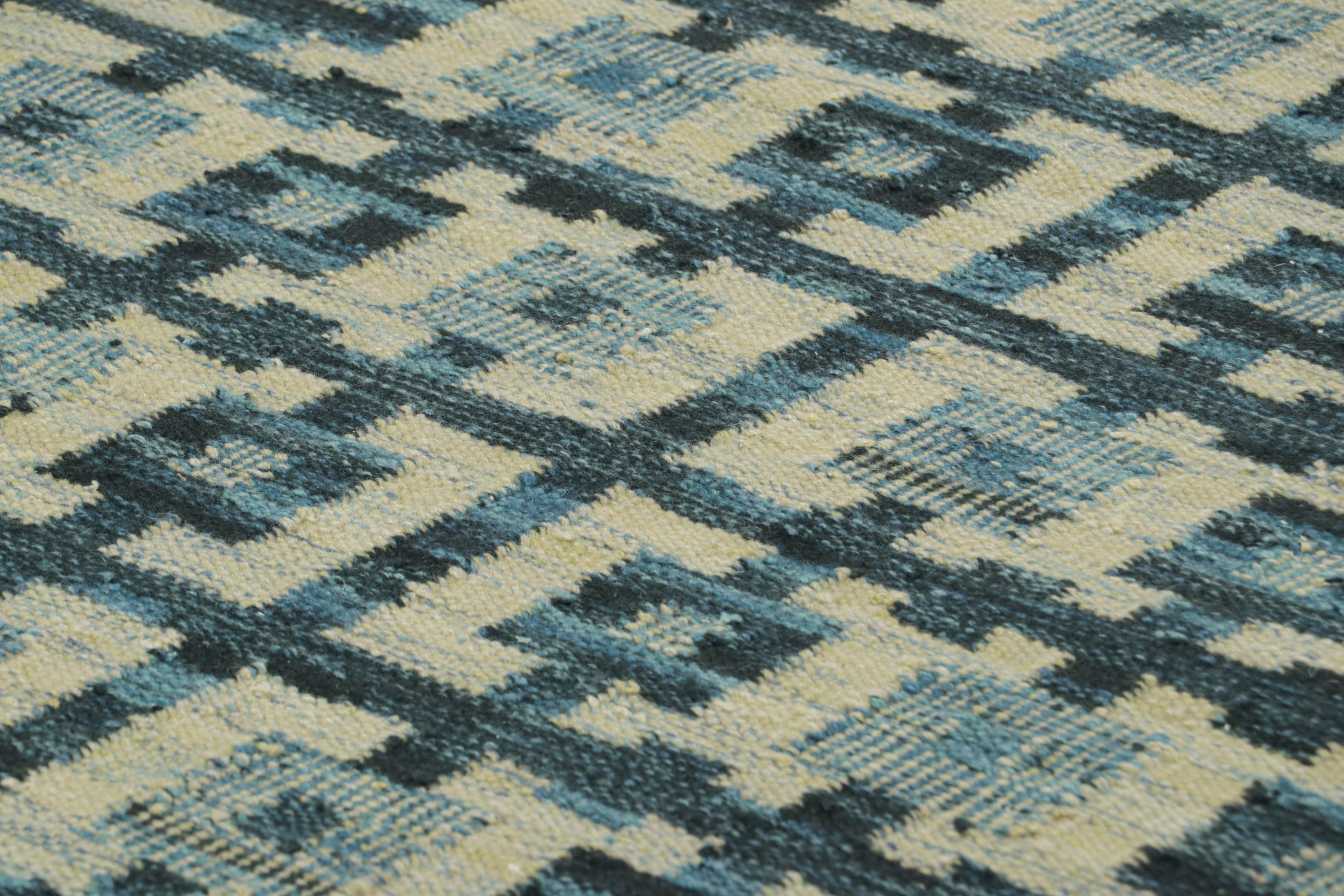 Questo tappeto 5x7 è una nuova aggiunta alle trame piatte della premiata collezione di tappeti scandinavi di Rug & Kilim. Realizzato con lana tessuta a mano, il suo design si ispira ai disegni tessili minimalisti svedesi di metà secolo delle