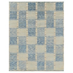 Rug & Kilim’s Scandinavian Style Rug in Blue and Cream with Geometric Patterns