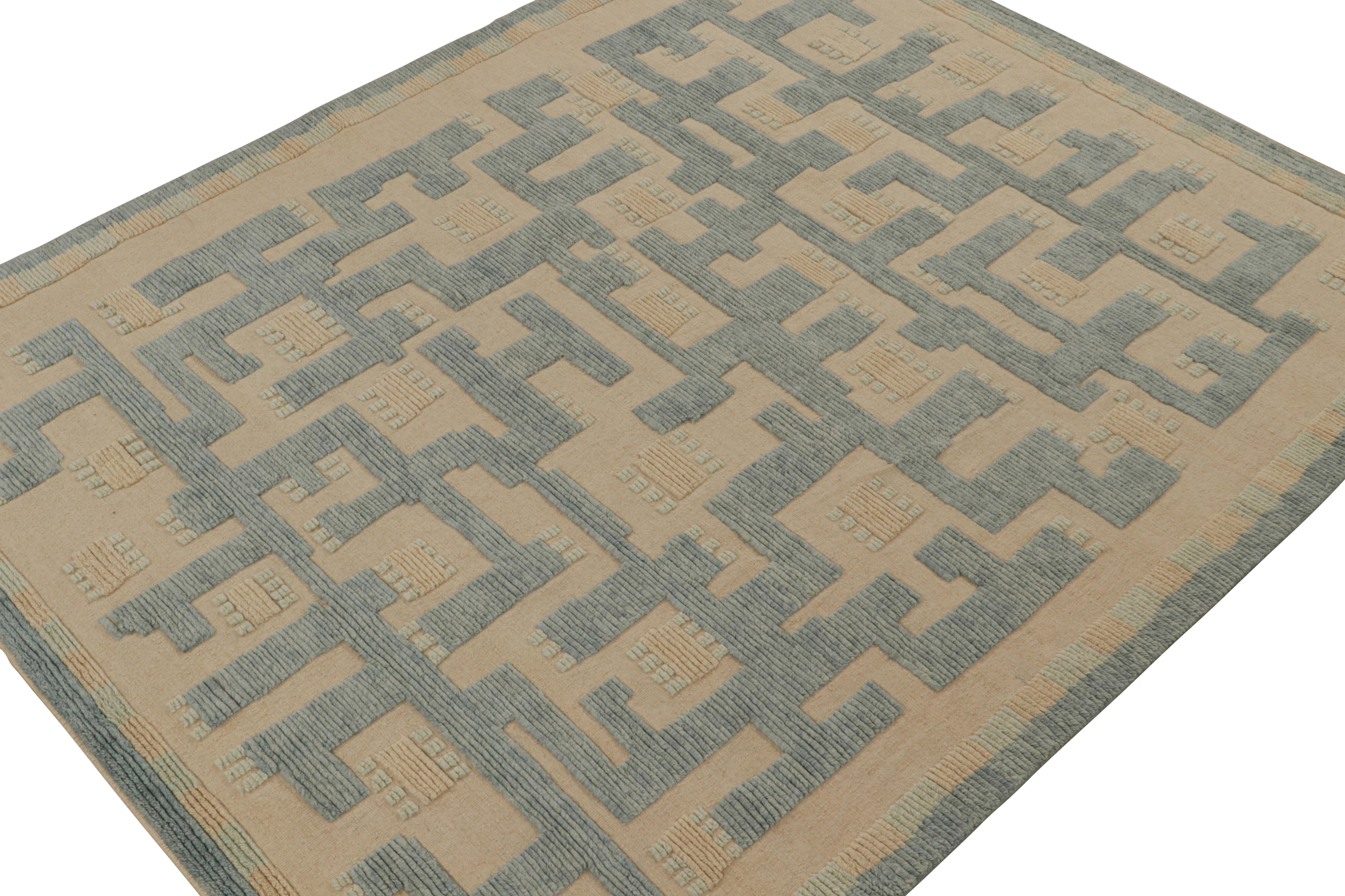 A smart 9x11 Swedish style rug from our award-winning Scandinavian collection. Handknotted in wool.

On the Design: 

This rug enjoys a high-low texture married to geometric patterns in blue & beige - creating an added depth in its presence. Keen