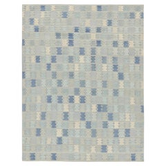 Rug & Kilim's Teppich im skandinavischen Stil in Blau, Creme und Grau mit geometrischen Mustern